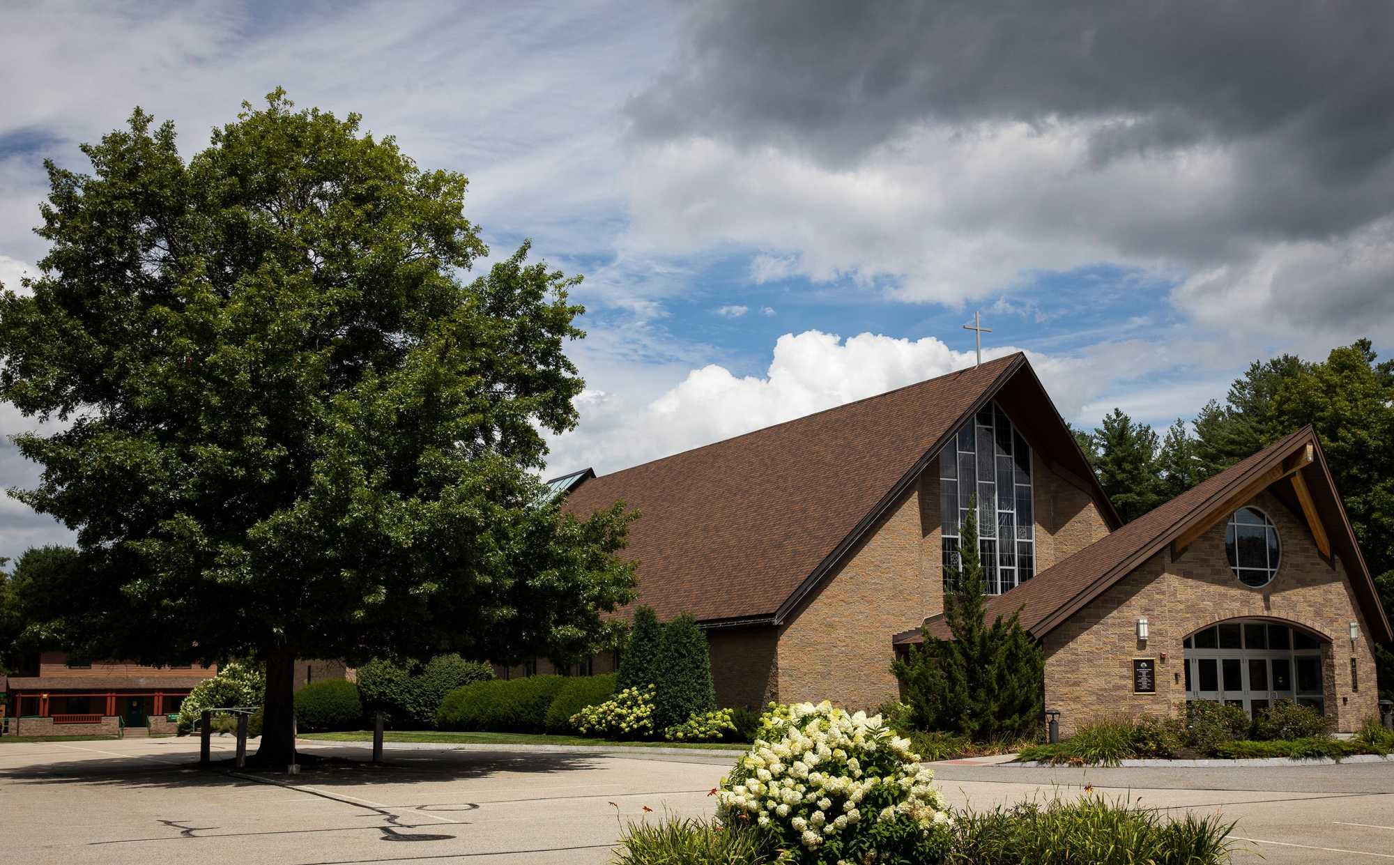 St. Elizabeth Seton Church in Bedford, N.H., a few miles from Catholic Medical Center in Manchester. In 2018, five physicians visited Monsignor John Quinn, a former hospital trustee, at his rectory there, asking for help. 