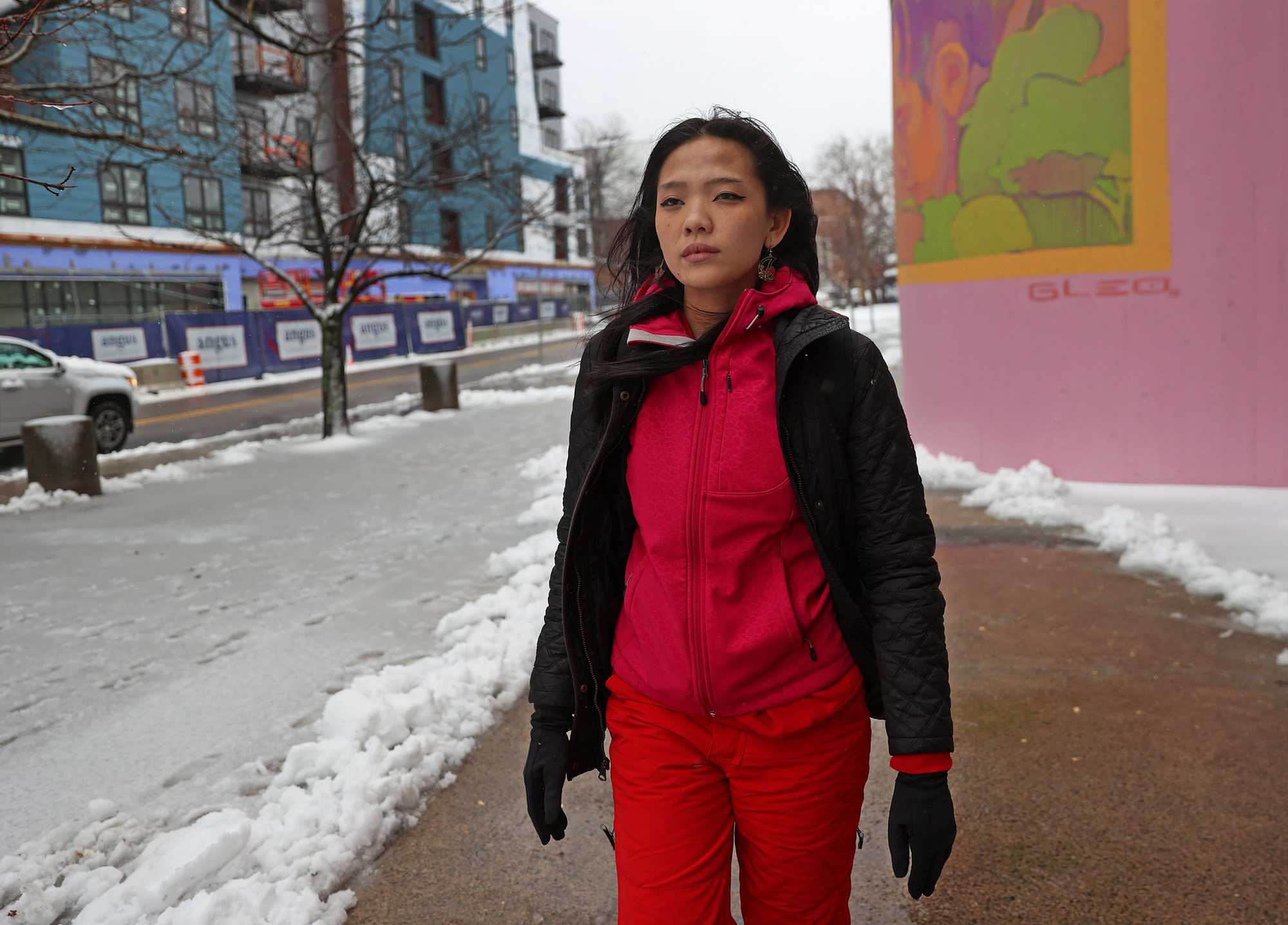 Fiona Phie walked near Umana Academy, where they went to elementary school. They live with their mom and younger brother in an East Boston home their immigrant parents bought decades ago.