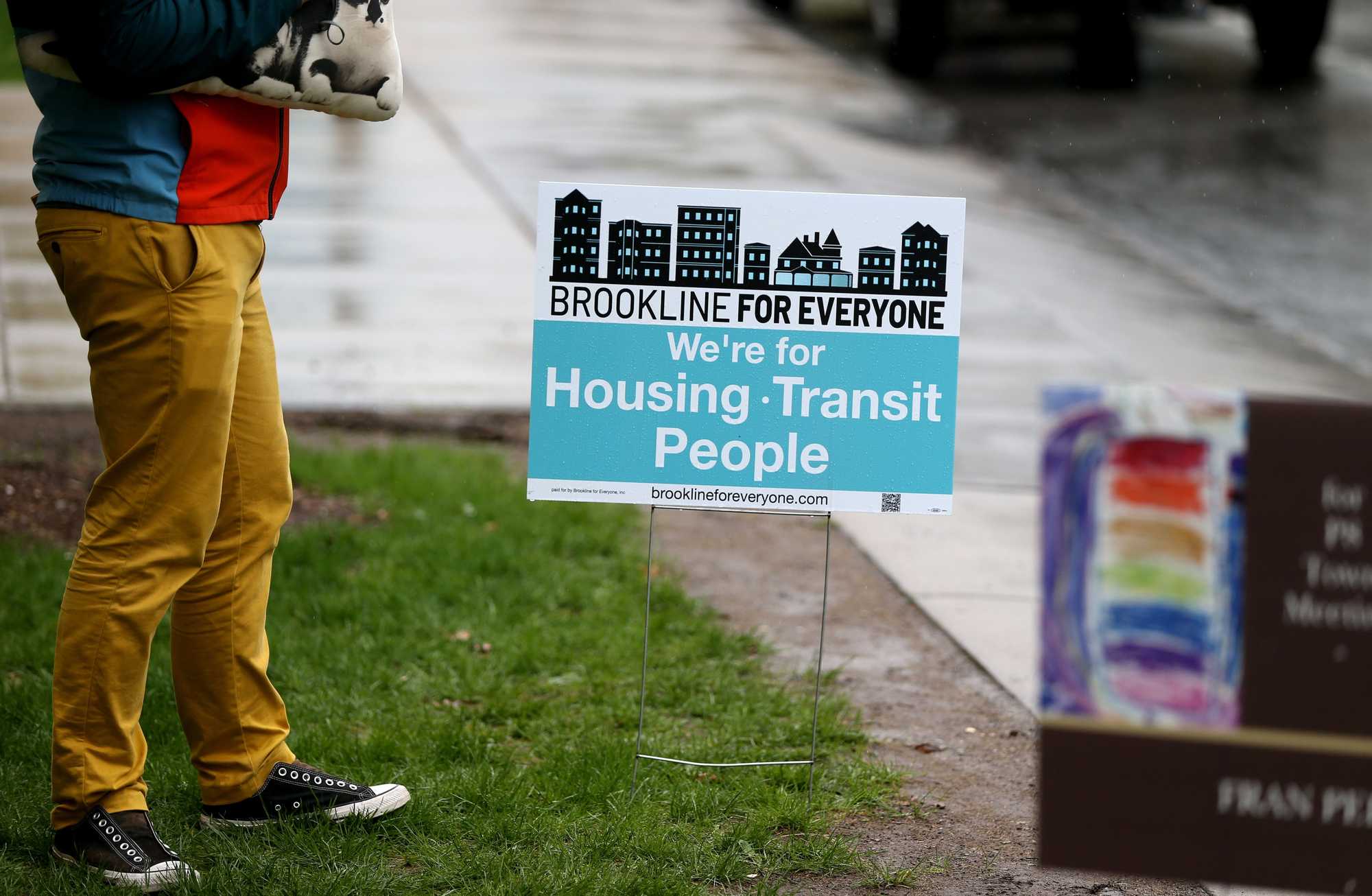 Yard signs for "Brookline for Everyone" dotted many lawns before a local election in May. In their current campaign – called Yes! in Brookline – the group has joined the Greater Boston Interfaith Organization and the Brookline Community Development Corporation to push Town Meeting to adopt zoning changes that could lead to hundreds of new housing units. (photos by Jonathan Wiggs /Globe Staff) 