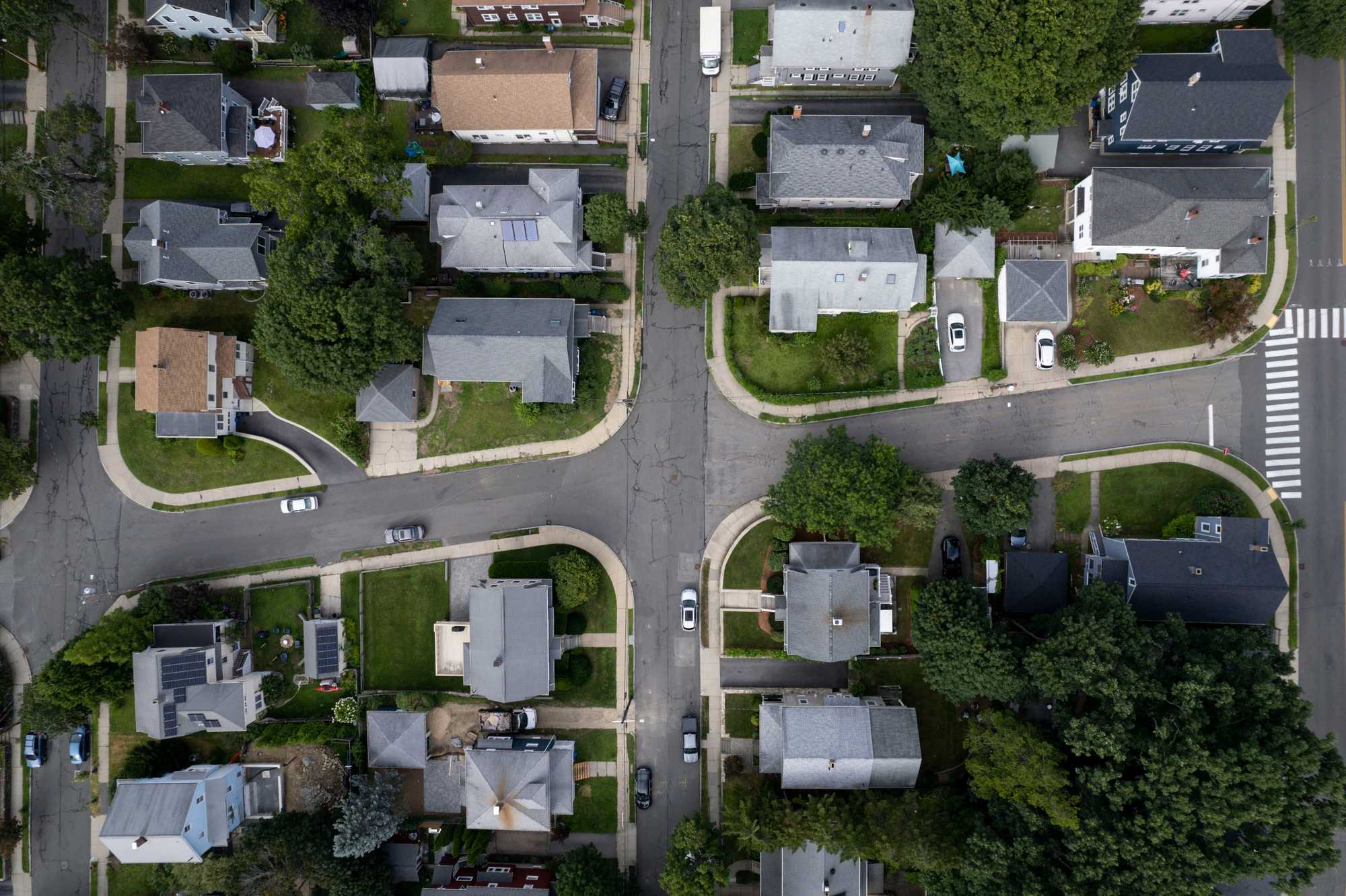 Neighborhoods zoned for single-family homes dominate many of the Boston suburbs.