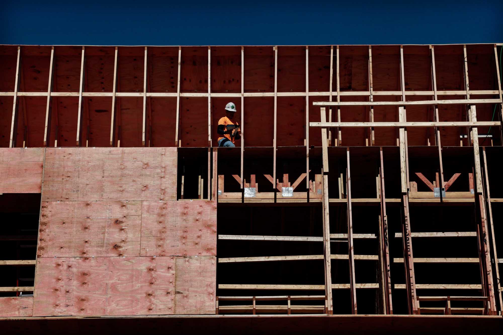 Construction workers at the Puddingstone at Chestnut Hill on Sherman Road in Brookline.