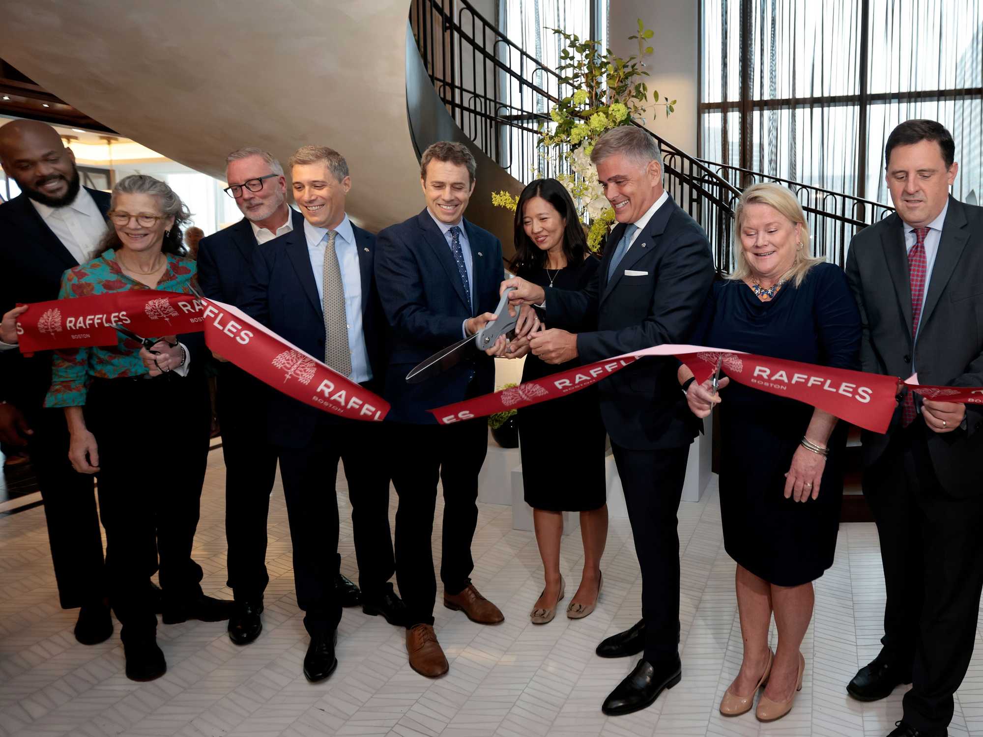 Boston, MA  9/18/23  Boston Mayor Michelle Wu (cq) is flanked by Noannet Group (cq) president Jordan Warshaw (cq), left, and Omer Acar (cq), CEO of Raffles & Orient Express (cq).  A ribbon cutting is held, on the 17th floor Sky Lobby, to signal the opening of Raffles Boston (cq), a luxury hotel and residence highrise at 40 Trinity Place.  (Photo by Pat Greenhouse/Globe Staff)  Story by Rebecca Ostriker
XXOneDalton
XXOneDalton10
