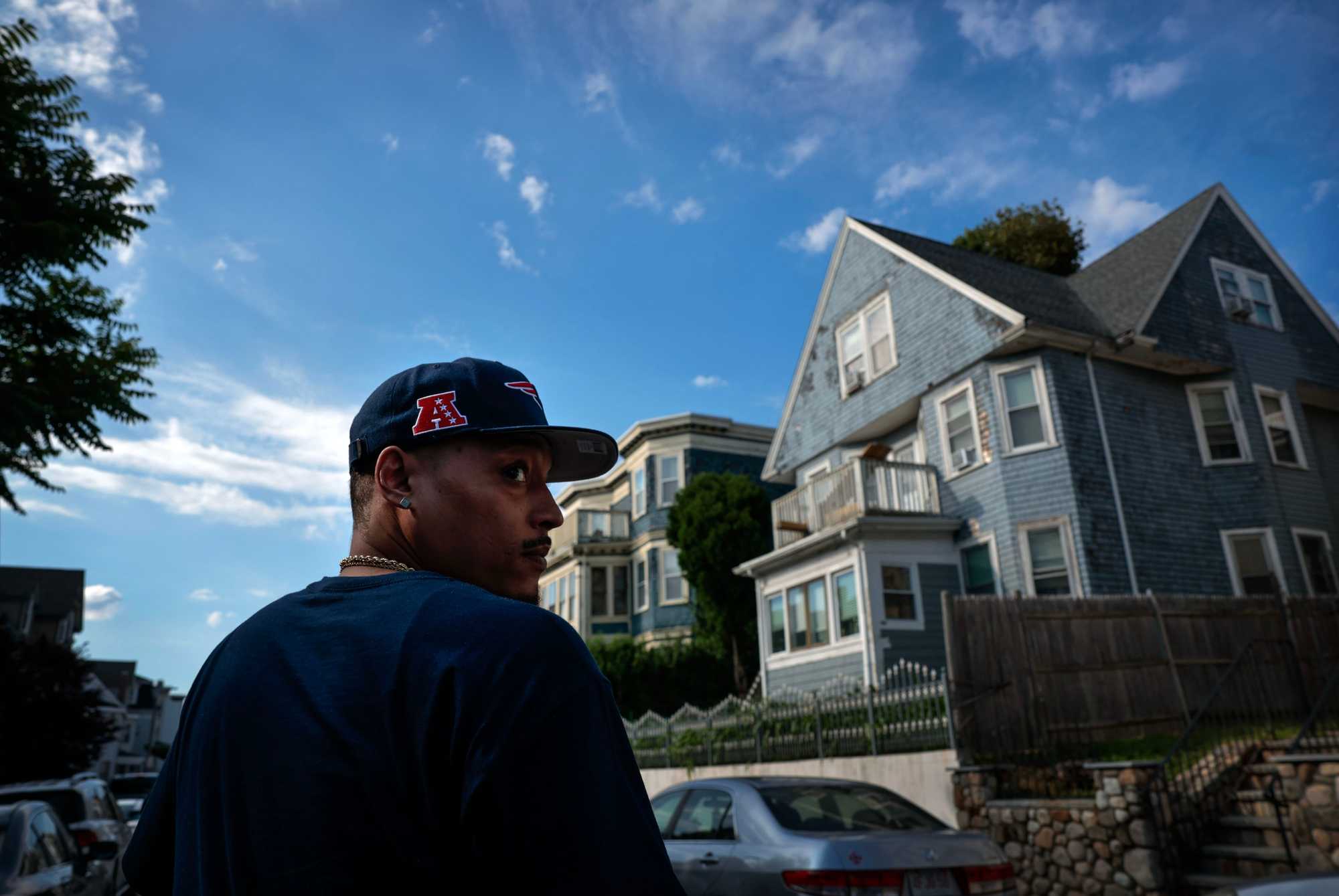 Milton DoSouto approached his family home (right) on Hamilton Street, where he and his brother Mike formed the Cape Verdean Outlaws during a deadly, decades-long street war. 