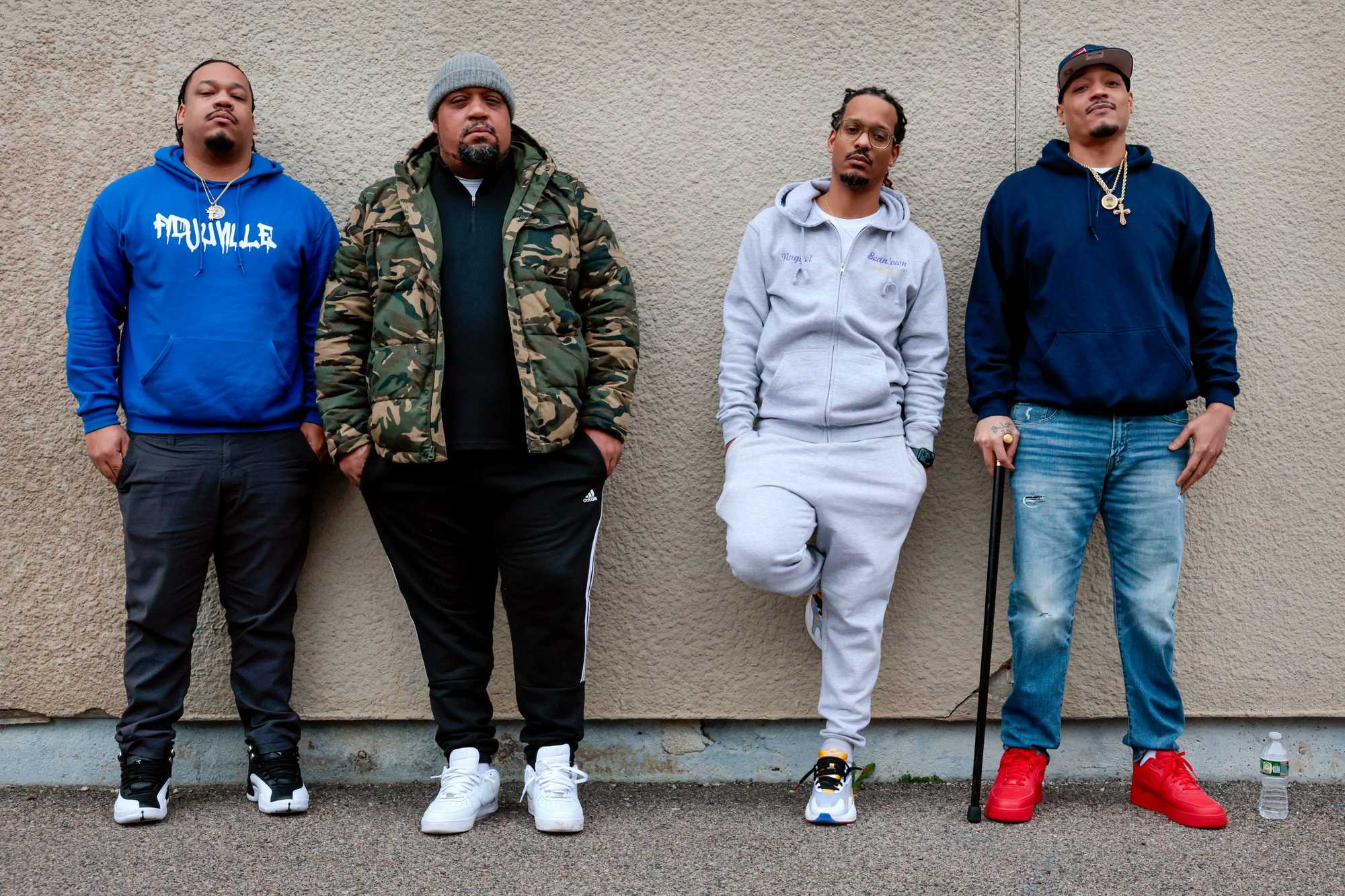 Brothers, from left, Anthony DoSouto, Mike Fernandes, Steve “Nugget” DoSouto, and Milton DoSouto stood outside the Holland Community Center in Dorchester. Their parents emigrated from Cape Verde in 1982. 