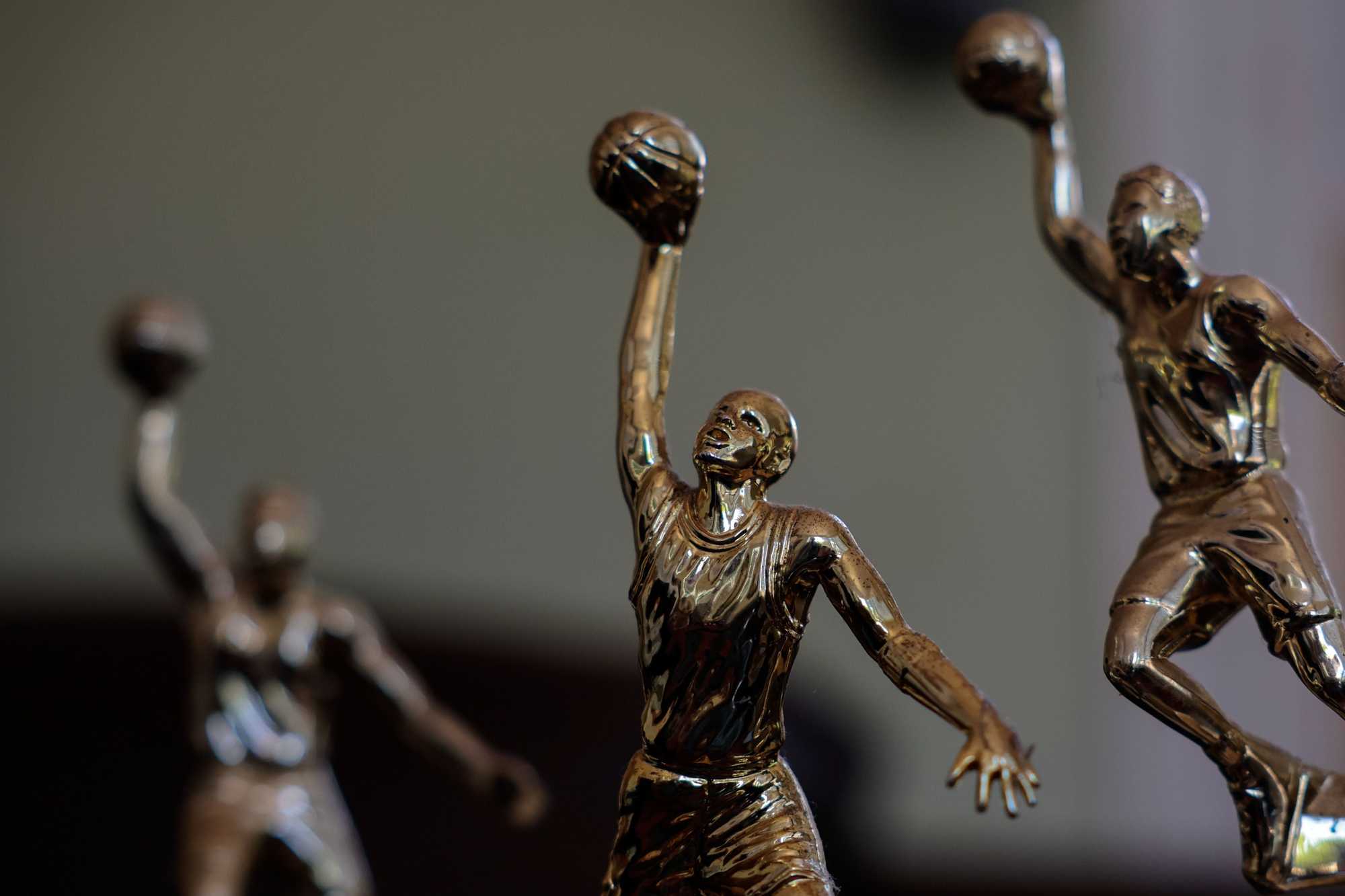  Alex DoSouto's basketball trophies symbolize the hope his family had for his future.