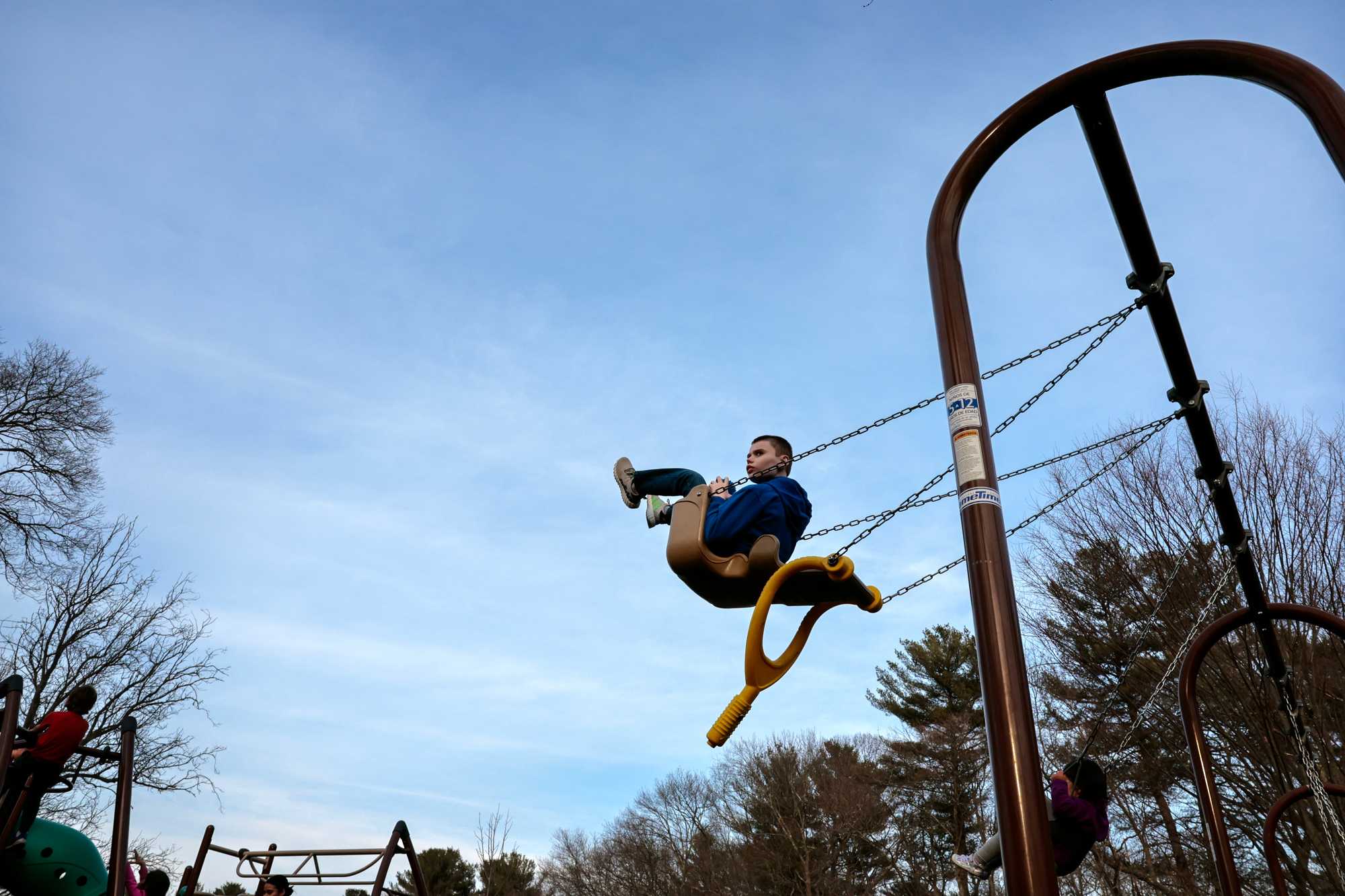 Dante Fowler was pushed on a swing by Phil Corriveau at Sturges Park in Reading in March. Phil says Dante loves the swing and could stay here all day. Phil met Dante when the boy was 5, and said, "When I first met Dante, I was in awe of him, I was amazed. I thought, 'What is he thinking?'"