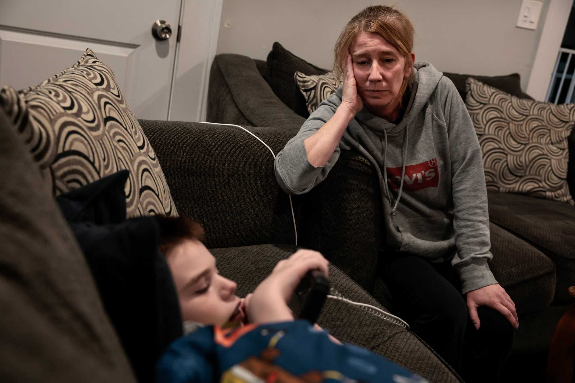 Jen Fowler sat with Dante at their home in Wakefield in March. Jen worries about Dante’s isolation. She said, “He’s bored, he’s depressed, he’s definitely regressing. He doesn’t know how to interact with his peers. Now he has anxiety. He used to be in a classroom, on a bus. How do you go from that to this?”