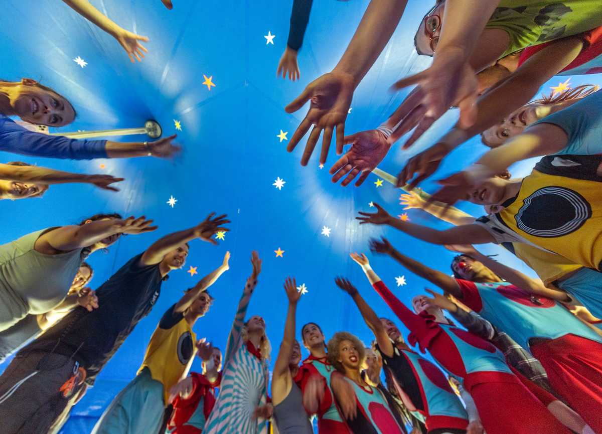 They call this “Smirko,” where performers circle together for a pep talk, before showtime at the Circus Smirkus 2025 Big Top Tour in Wrentham.