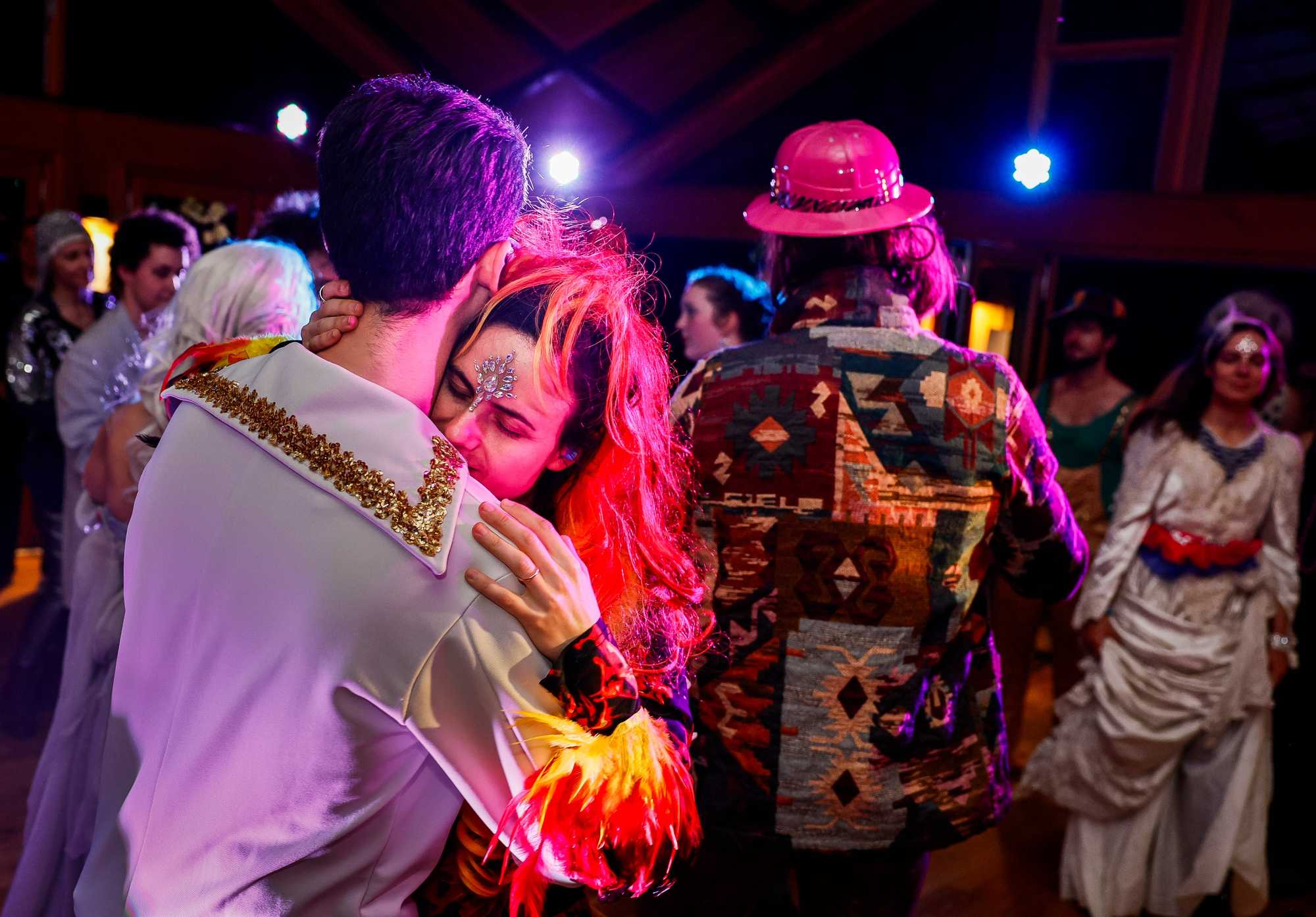 Wren Elhai dances with his wife, Lisa Einstein, during Monday night karaoke.