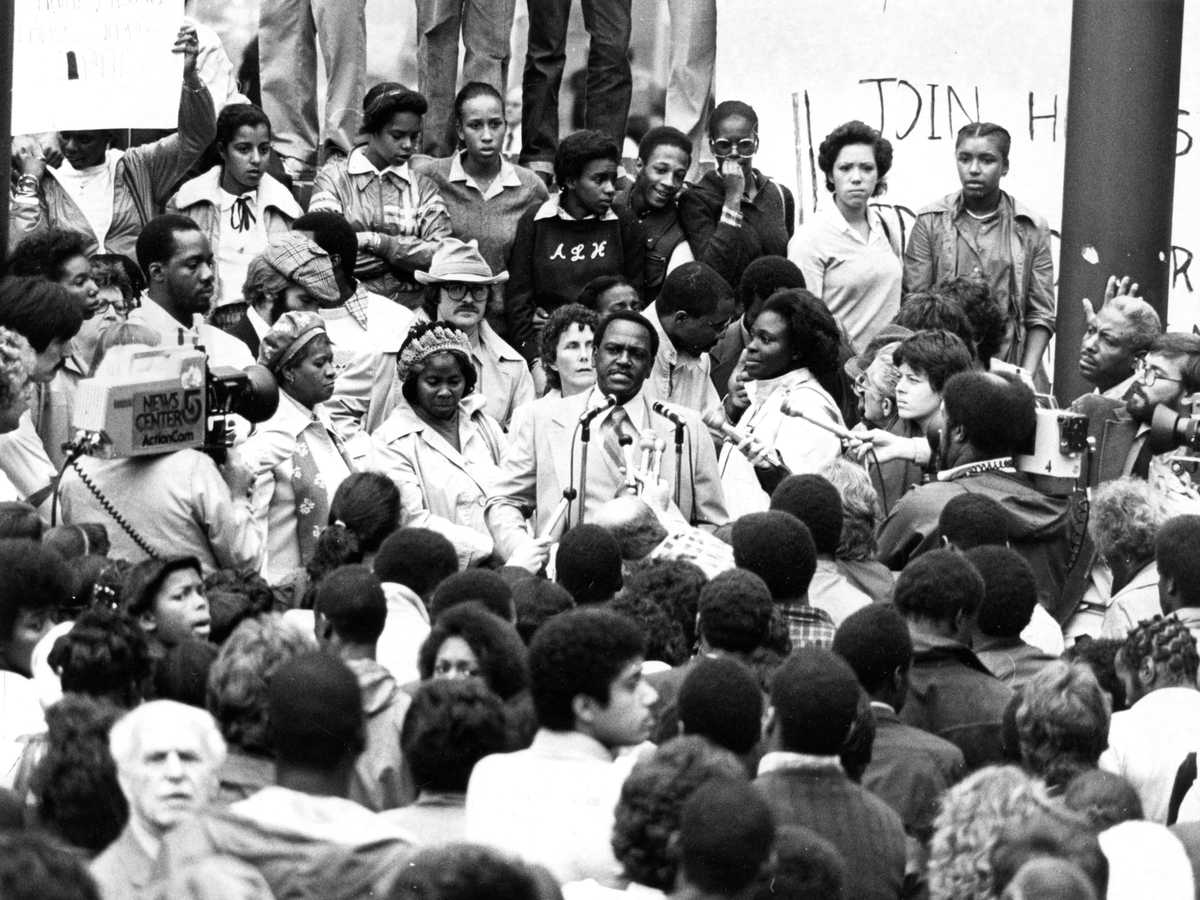Boston Deputy Mayor Clarence "Jeep" Jones speaks to a crowd at City Hall Plaza on Oct. 3, 1979, addressing students who walked out of classes in protest of the shooting of 16-year-old Darryl Williams at a Charlestown High game days earlier.