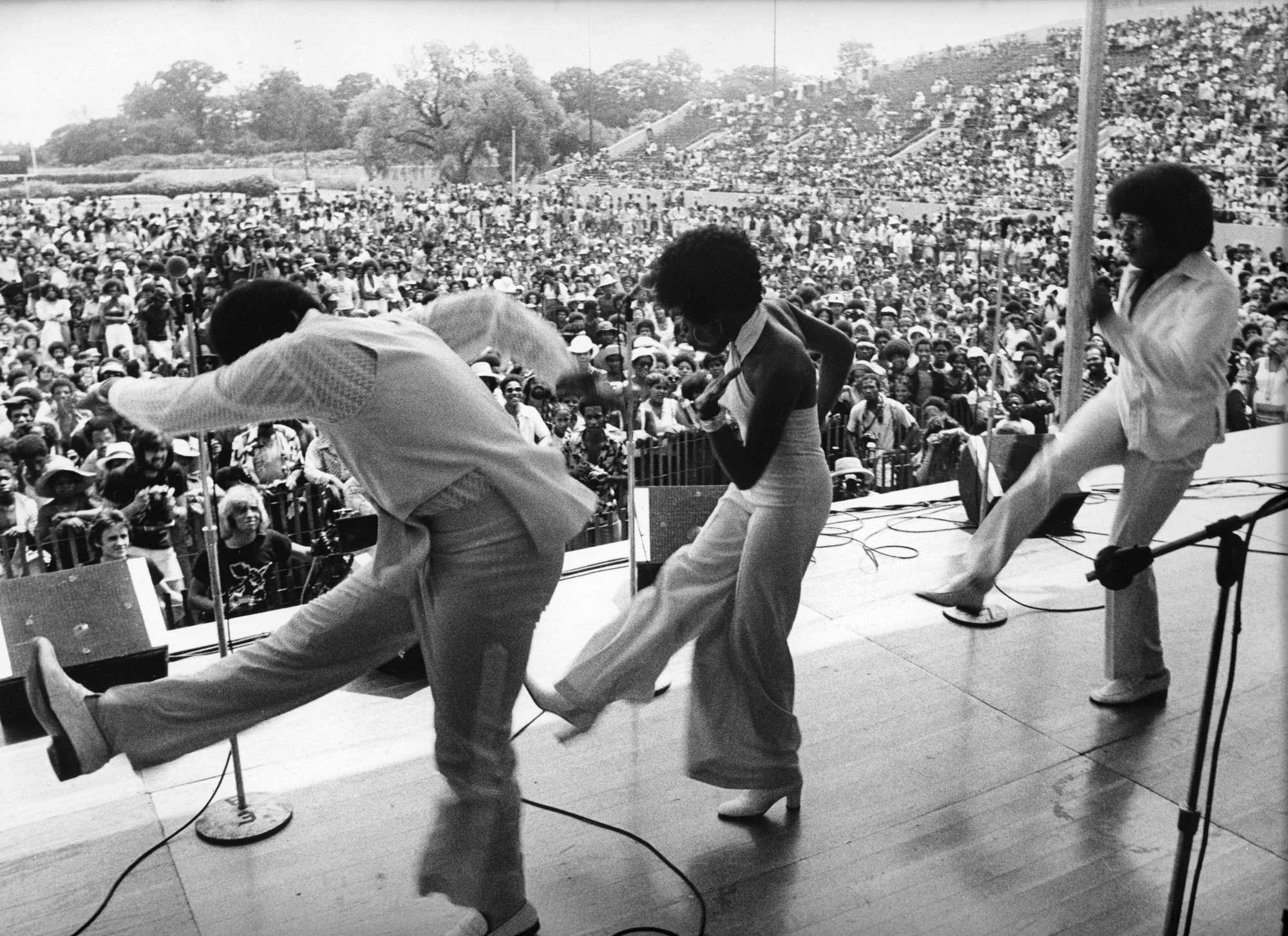 In front of a crowd of 30,000 on July 7, 1974, The Hues Corporation — most famous for their single "Rock the Boat" — perform at White Stadium.