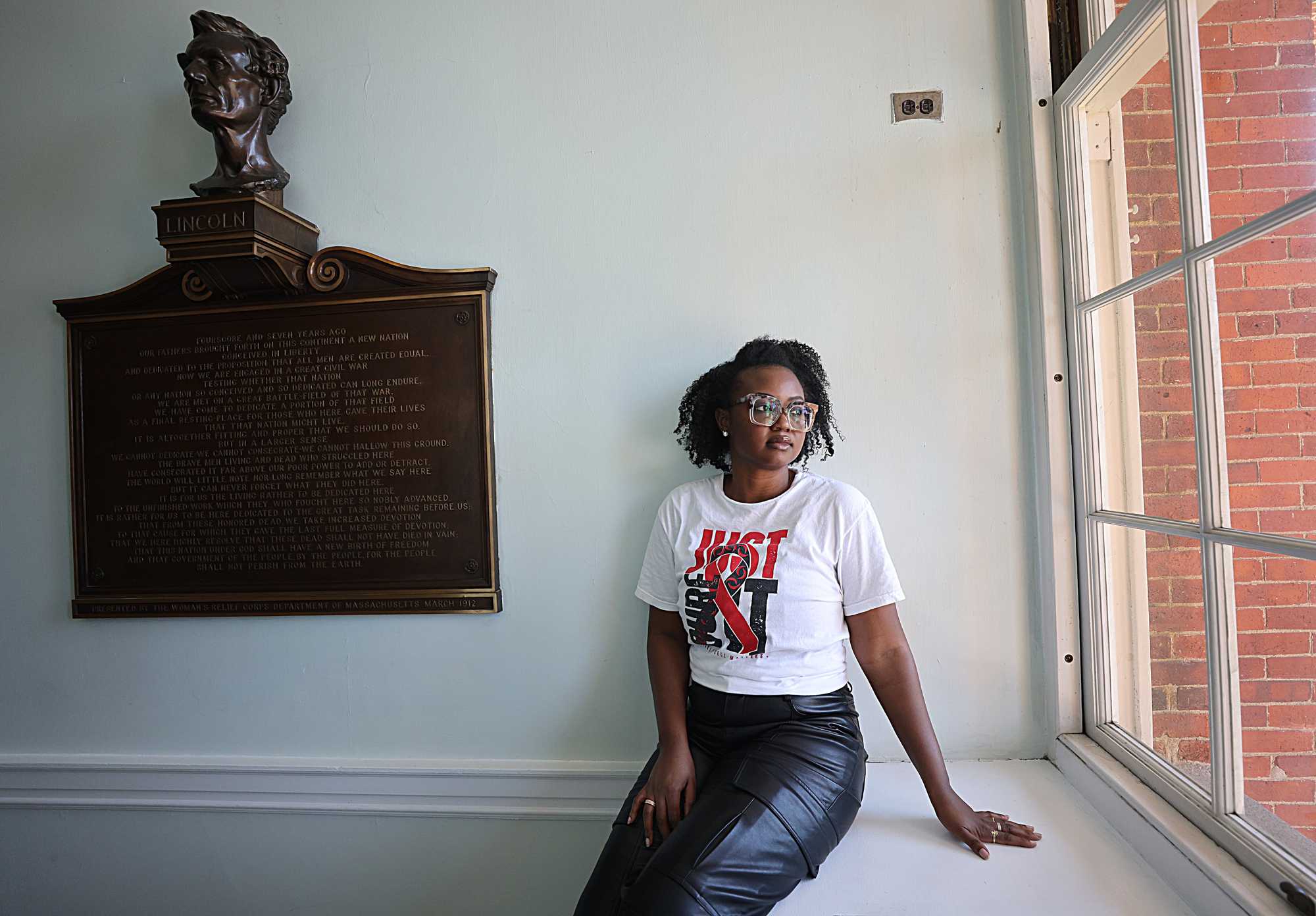 Olaide Adekanbi, shown at the Massachusetts State House, has had to debate between being a mom, or exploring gene therapy to treat her sickle cell disease.