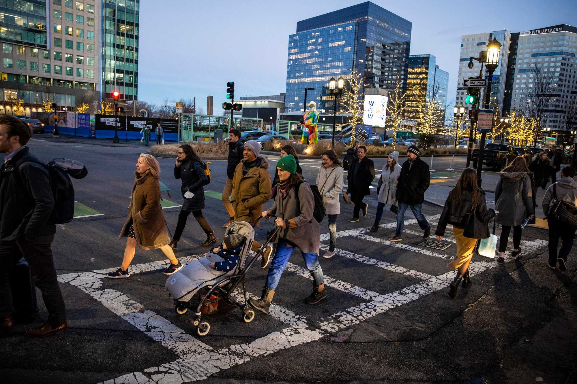 Pedestrians along Seaport Boulevard on a winter afternoon in 2023.
