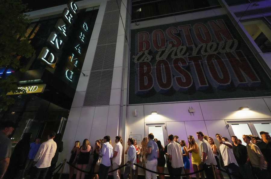 Boston, MA - 5/10/2024 -  xxliquorlicenses  -  A line forms outside The Grand nightclub in the seaport for liquor license series. When Scorpion Bar / The Grand opened in 2017, it was the first nightclub in the Seaport.  Scorpion Bar / The Grand got one of the unrestricted licenses from the 2014 legislation that created new liquor licenses.  (Photo by:  Barry Chin/Globe Staff ) Section:  Business, Reporter:  Shirley Leung, Arc ID:  65f43e2c3689150b2515d390