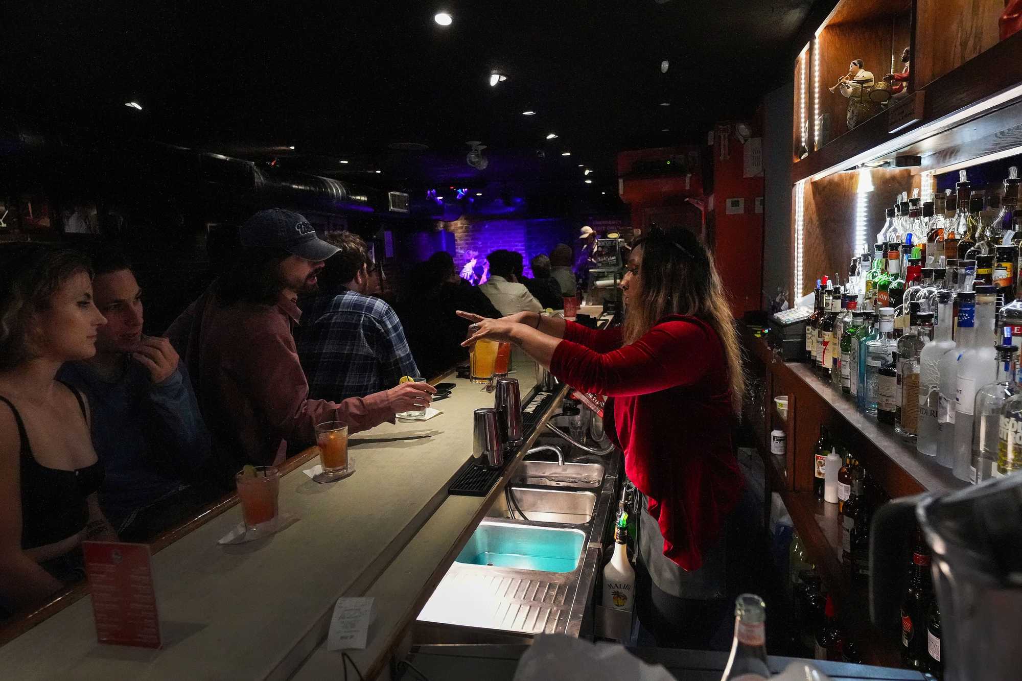 Bartender Kendra Calloway served patrons at Wally’s Jazz Club in the South End.