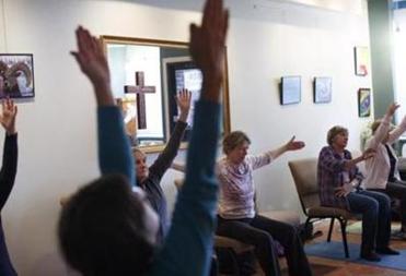 Chair yoga has been one of the most popular offerings at the storefront church.