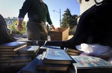 The smaller community no longer needed many things, including these hymnals, which were picked up by a mobile ministry.