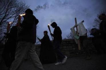 During the congregation’s second Easter since leaving their old church, three teenage boys carried torches across the river. Wendy was ready to talk about resurrection.