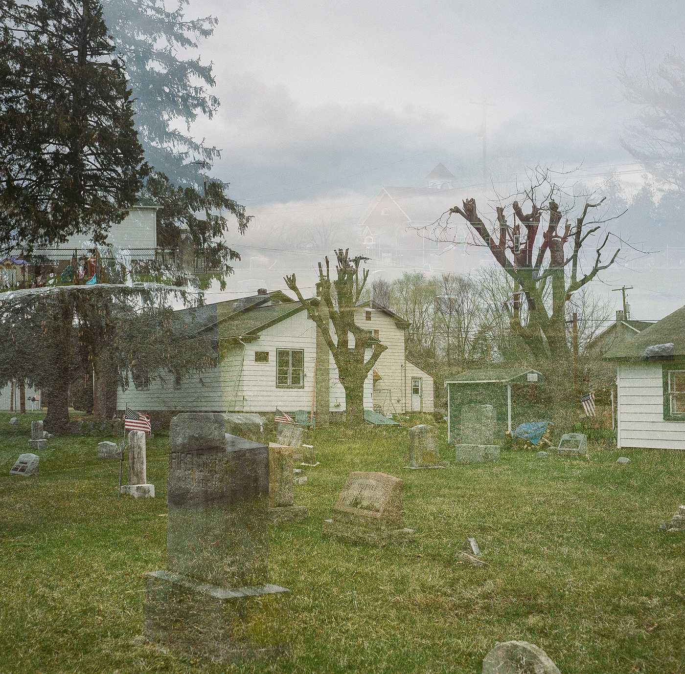 A double-exposure of Kate’s childhood home overlaid with the neighboring cemetery. 