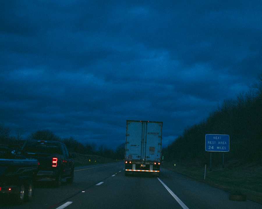 Central Penn. - 4/1/2022 On right, a truck passes a sign for the rest area where Kate remembers being taken as a child. Erin Clark/Globe Staff