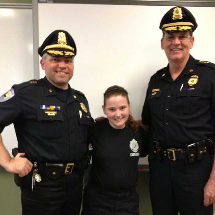 A photo Birchmore posted on Facebook in 2013 shows her with Robert Devine (left) and former Stoughton Police Chief Paul Shastany. She captioned it "Achieved sergeant : )"