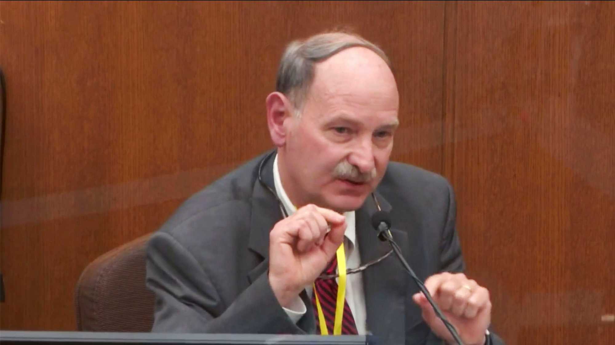 In this image taken from video, Dr. Bill Smock, a Louisville physician in forensic medicine, testifies in the trial of former Minneapolis police officer Derek Chauvin.