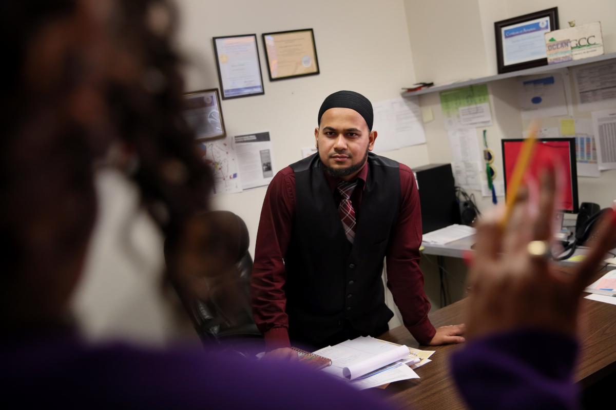 Rahman, who once aspired to become a doctor, talked to Carolyn McGee in his office at Codman Square Neighborhood Development Corp. in Dorchester, where he is the director of economic development.