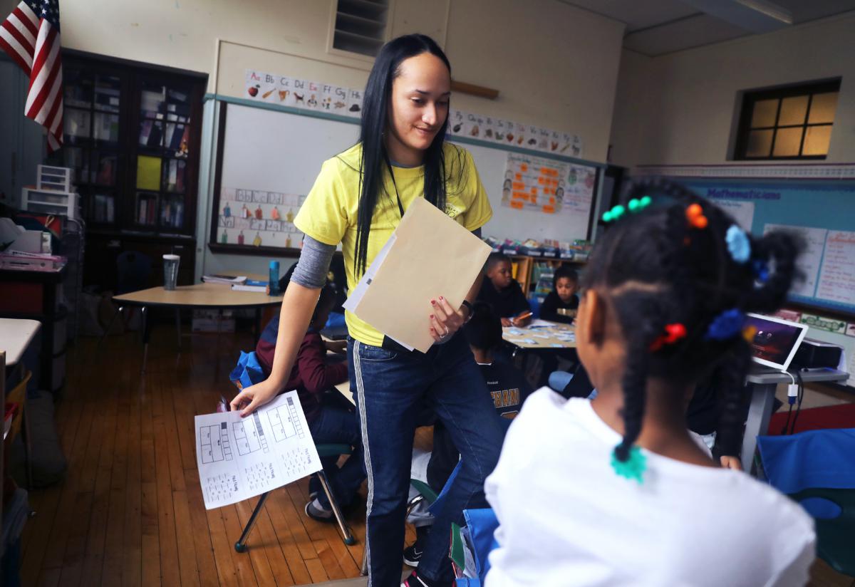 Lizbeth Ruiz, the 2007 valedictorian at Boston International High School, works as a paraprofessional in Eleanor Hanno's second-grade class at the Lee Academy Pilot School. She sometimes contemplates getting her teaching license.