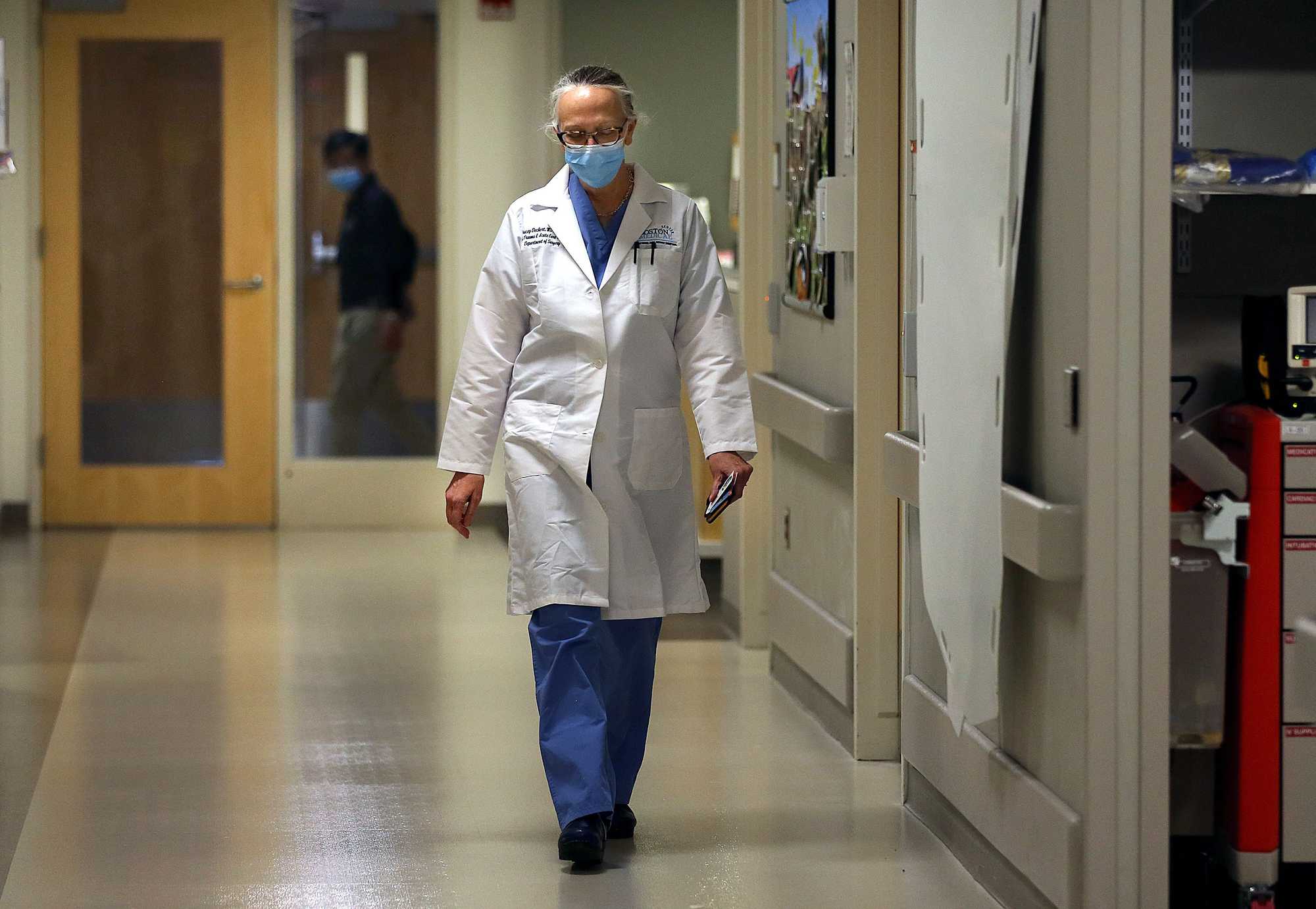 Dr. Tracey Dechert walked along the hallway at the Surgical Intensive Care Unit at Boston Medical Center. 