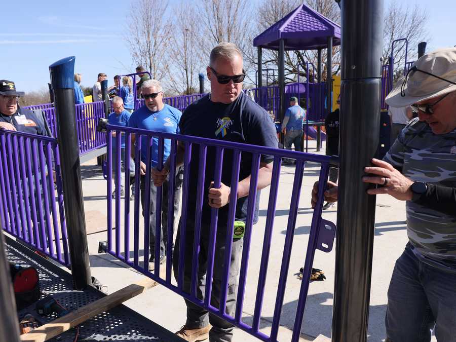Firefighter Jimmy Plourde and other volunteers worked to build a playground in Hamilton, N.J. for Where Angels Play, an organization spun out of the Sandy Hook massacre that builds playgrounds in underserved areas.