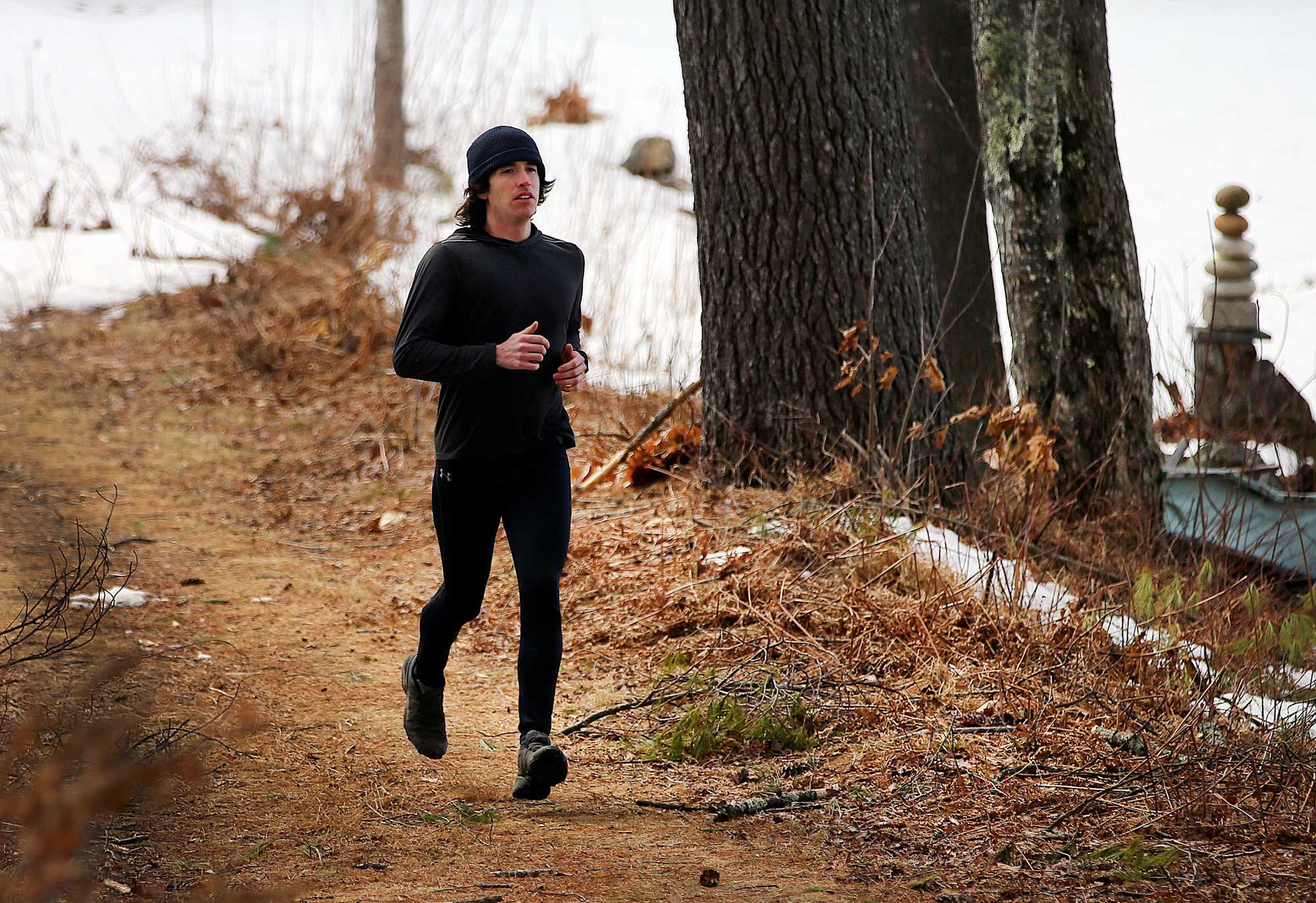 Bobby O’Donnell ran along a trail near his Hopkinton home. He was a 19-year-old runner in the 2013 Boston Marathon and was on Mass. Ave. when he heard the bombs go off.