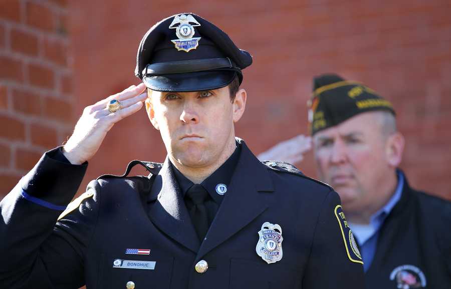  MBTA Police Officer Richard H. Donohue, Jr. saluted during Veterans Day Civic Exercises Nov. 11, 2013 in Winchester.   The grandson of O'Connell, Donohue was wounded in the Watertown shootout with the alleged Boston Marathon bombers.    