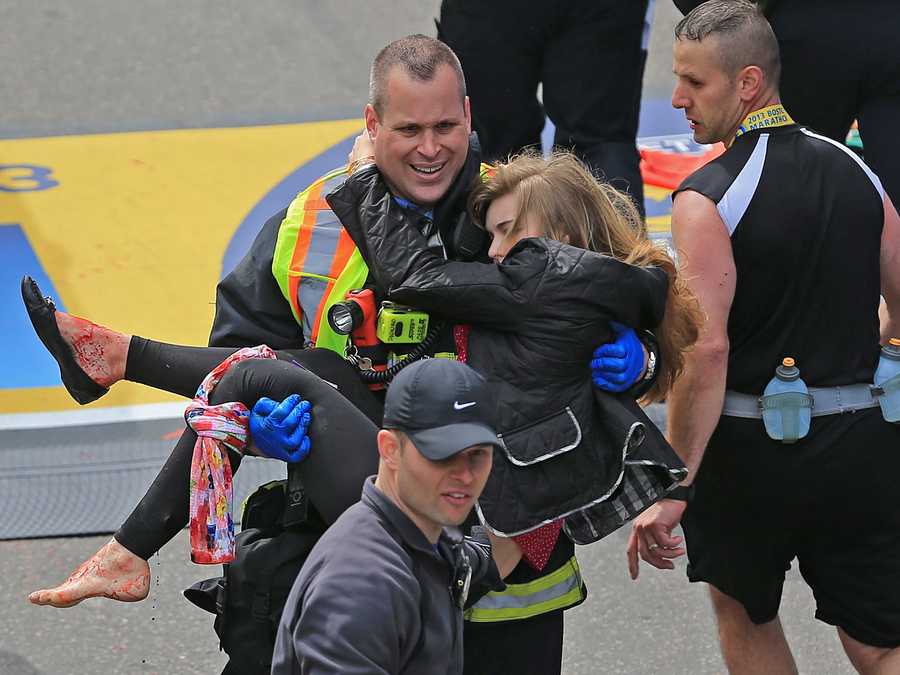 Jimmy Plourde carried victim Victoria McGrath to a stretcher after the bombing at the marathon finish line.