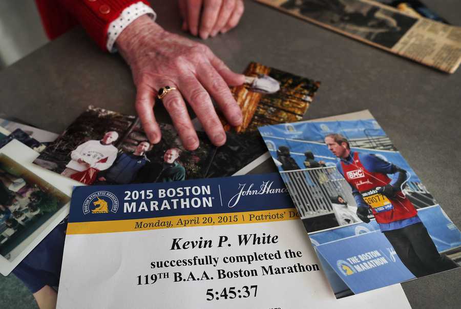 Photos and memorabilia of  Kevin White, including his 2015 Boston Marathon certificate and a photo of him finishing on Boylston Street.Kevin was also injured in 2013  as spectator and died in 2015.