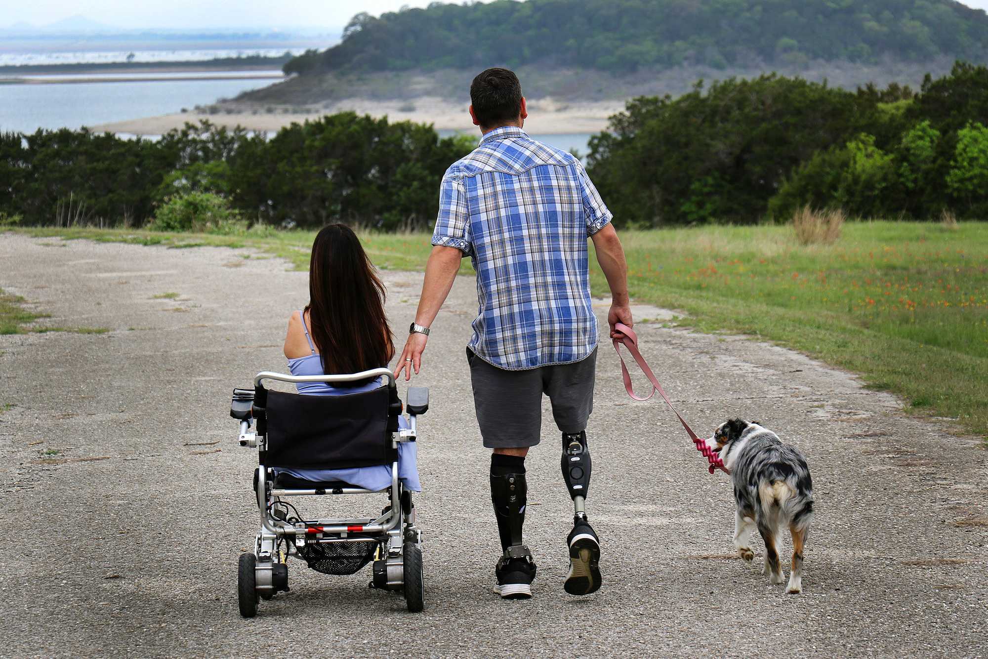  The couple walked through a park near their home with her dog, Sadie.