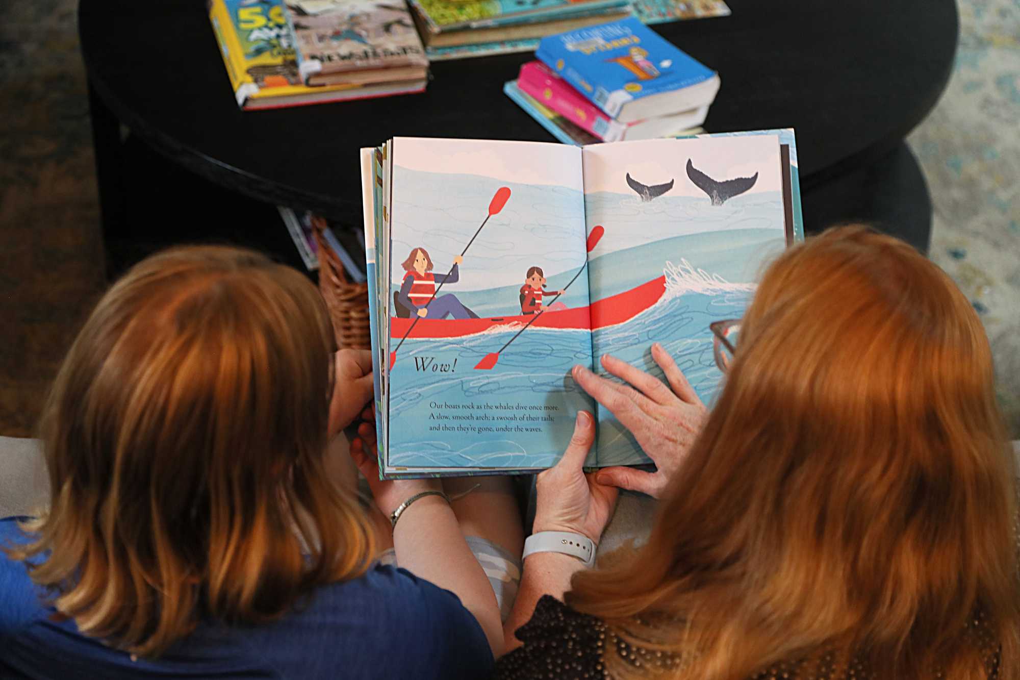 Ali Lynch (right) read with her daughter, Claire.
 