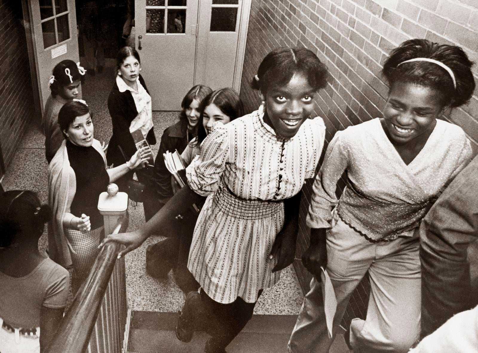 Aide Dawn Gesimondo asked students to walk upstairs in an orderly fashion at the Franklin Thomas School on Oct. 3, 1974.