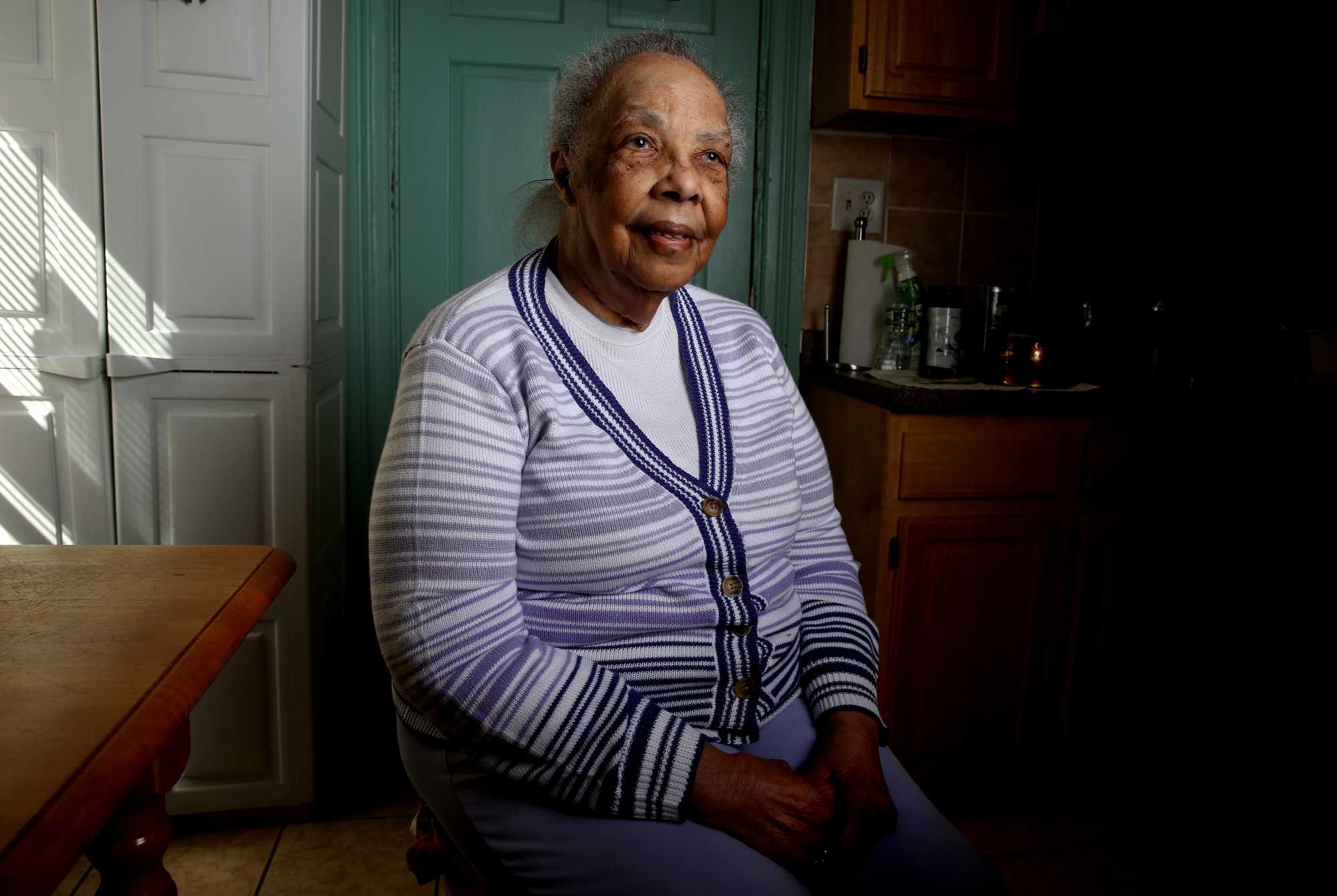 Earline Pruitt was one of the plaintiffs who sued Boston Public Schools for better education for Black children. After the court ruling to integrate schools, two of her children were bused to Hyde Park High School from their Dorchester home. She is photographed in her Dorchester home. 