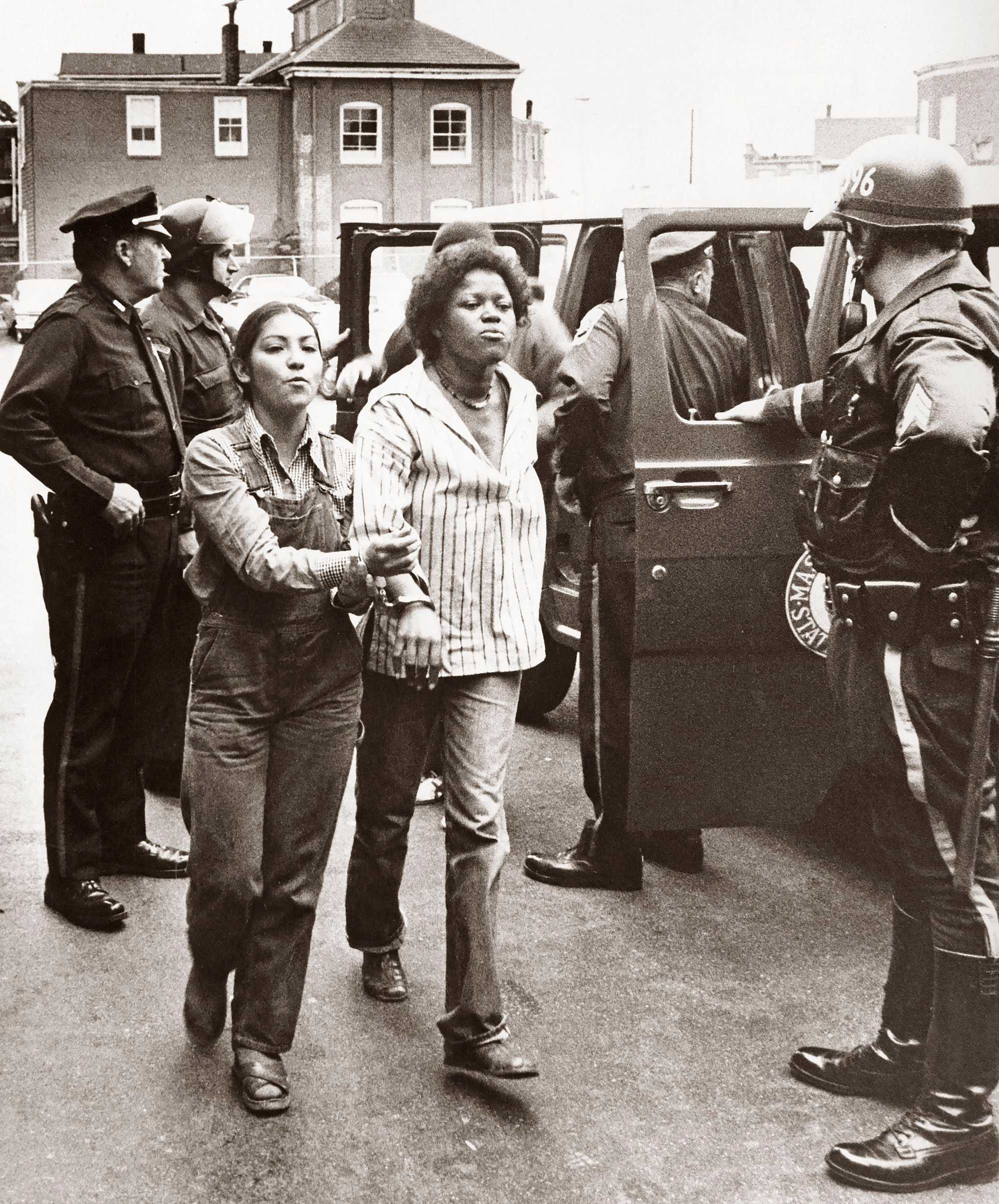 Members of the Committee Against Racism were arrested as they prepared to greet the students who were being bused to South Boston High on Sept. 8, 1975, during the first week of school. 