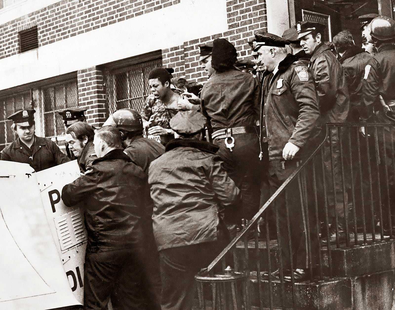 Police removed students and took them to Station 5 after trouble at Hyde Park High School on Jan. 9, 1975. (Paul Connell/Globe Staff) 