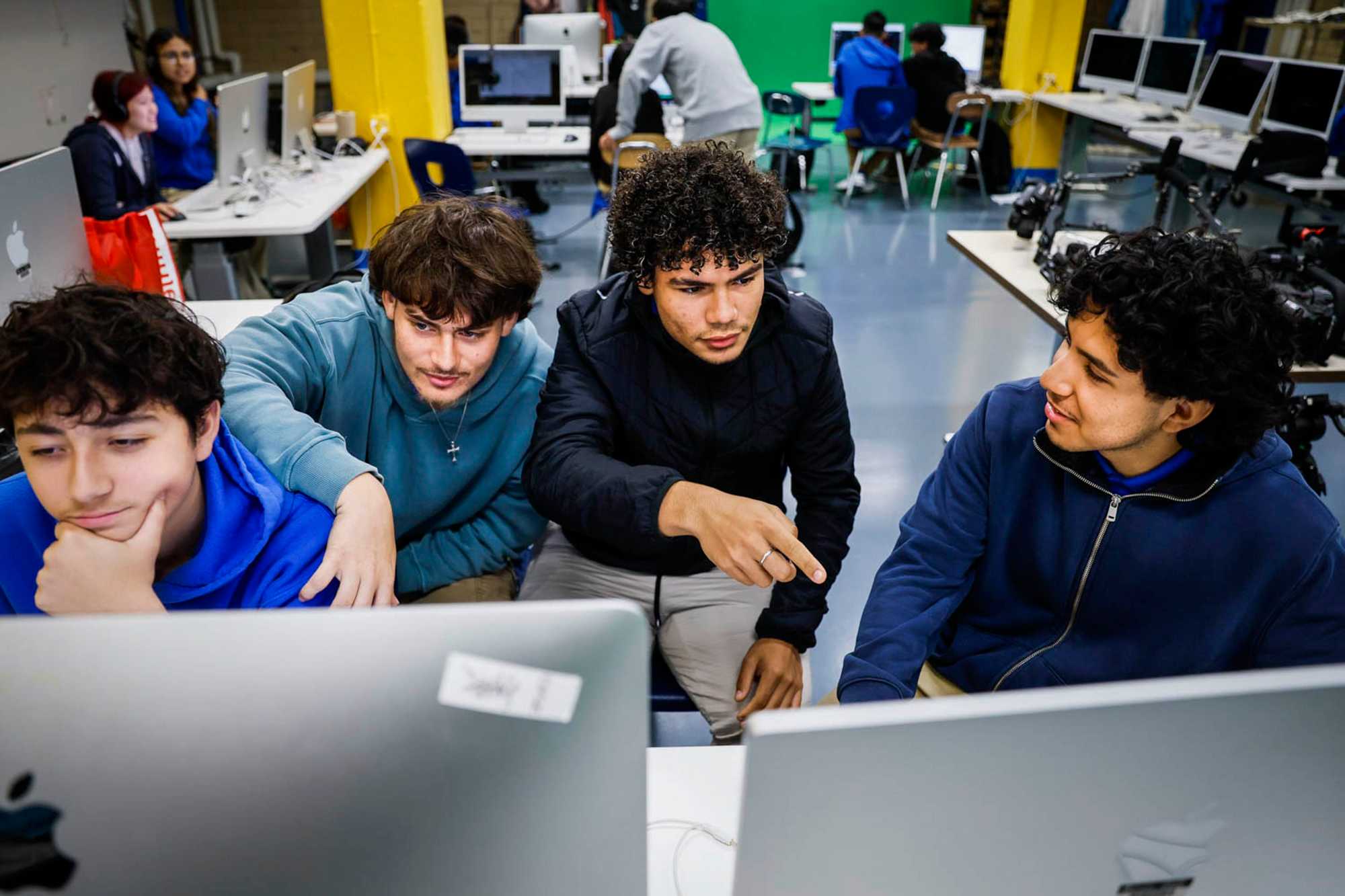 Students at East Boston High worked on a movie while attending their multimedia class on May 17. In addition to its arts and music programs, the school offers 13 language classes and more than 20 sports teams. (Erin Clark/Globe Staff)