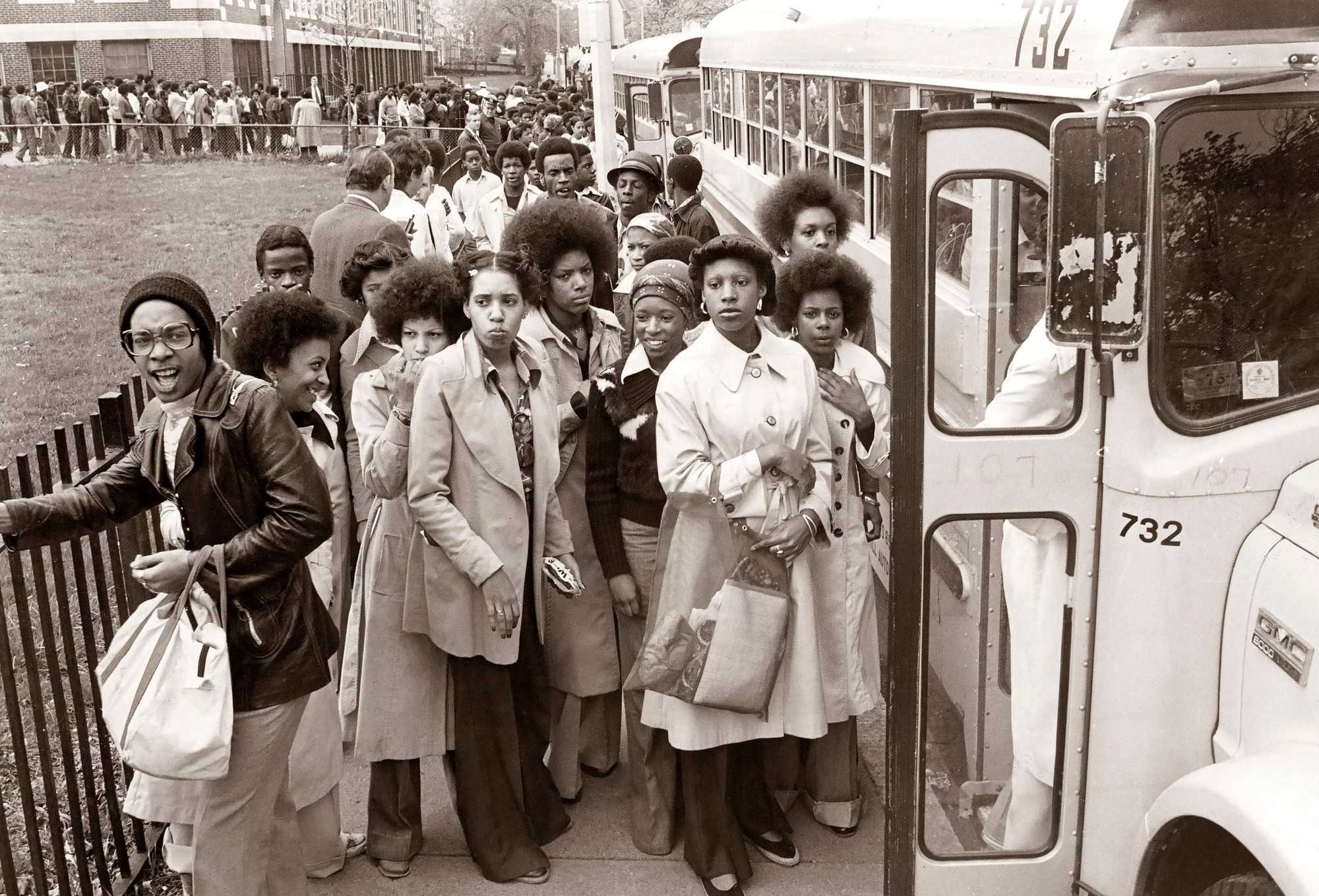 Students and buses lined up outside of Hyde Park High School in Boston on April 29, 1976. 