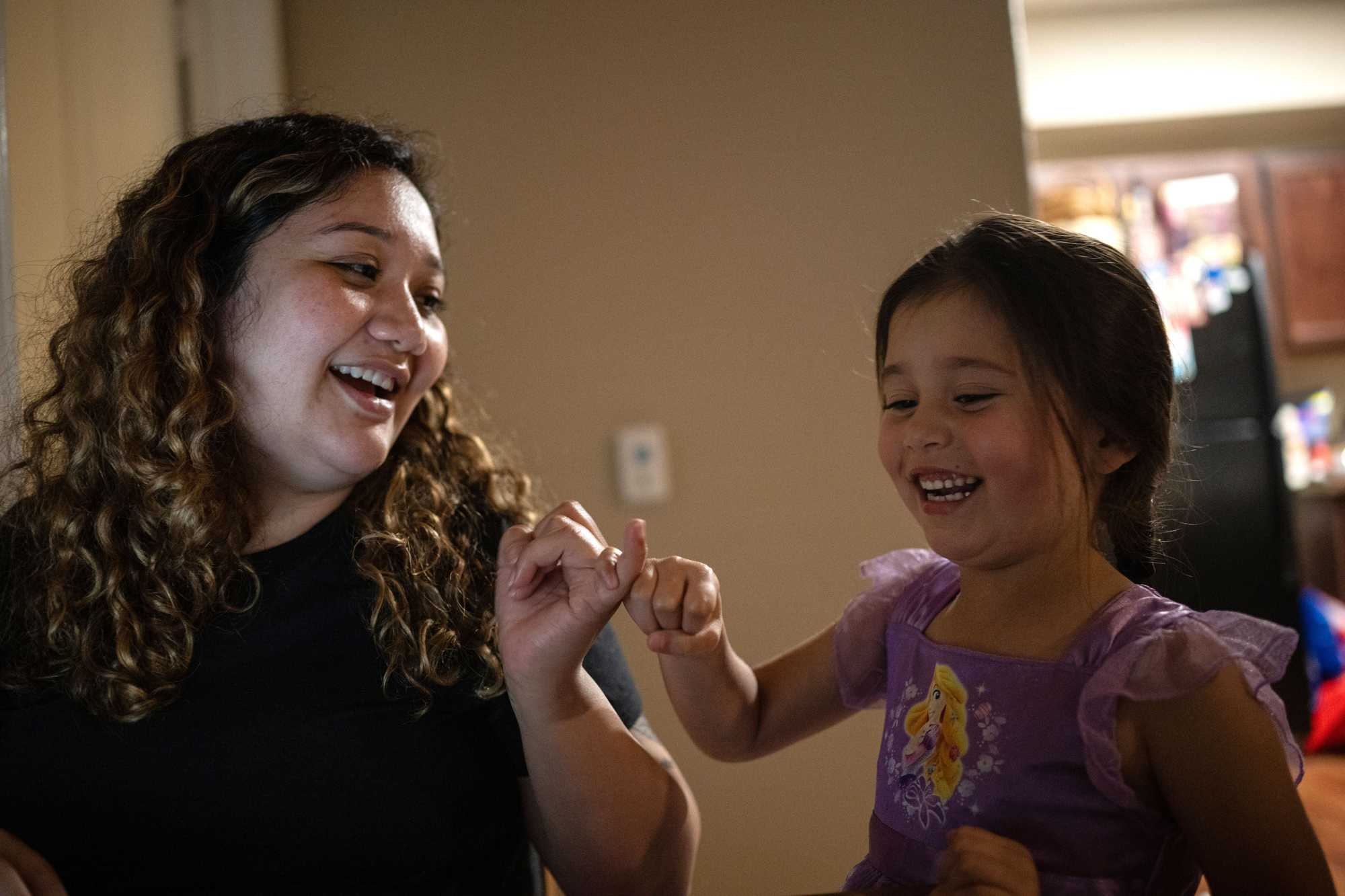 Osuna talked to Jae before putting her to bed. She hopes to one day work in a role that provides support to families like hers, connecting them to life-changing programs. (Tamir Kalifa for The Boston Globe)