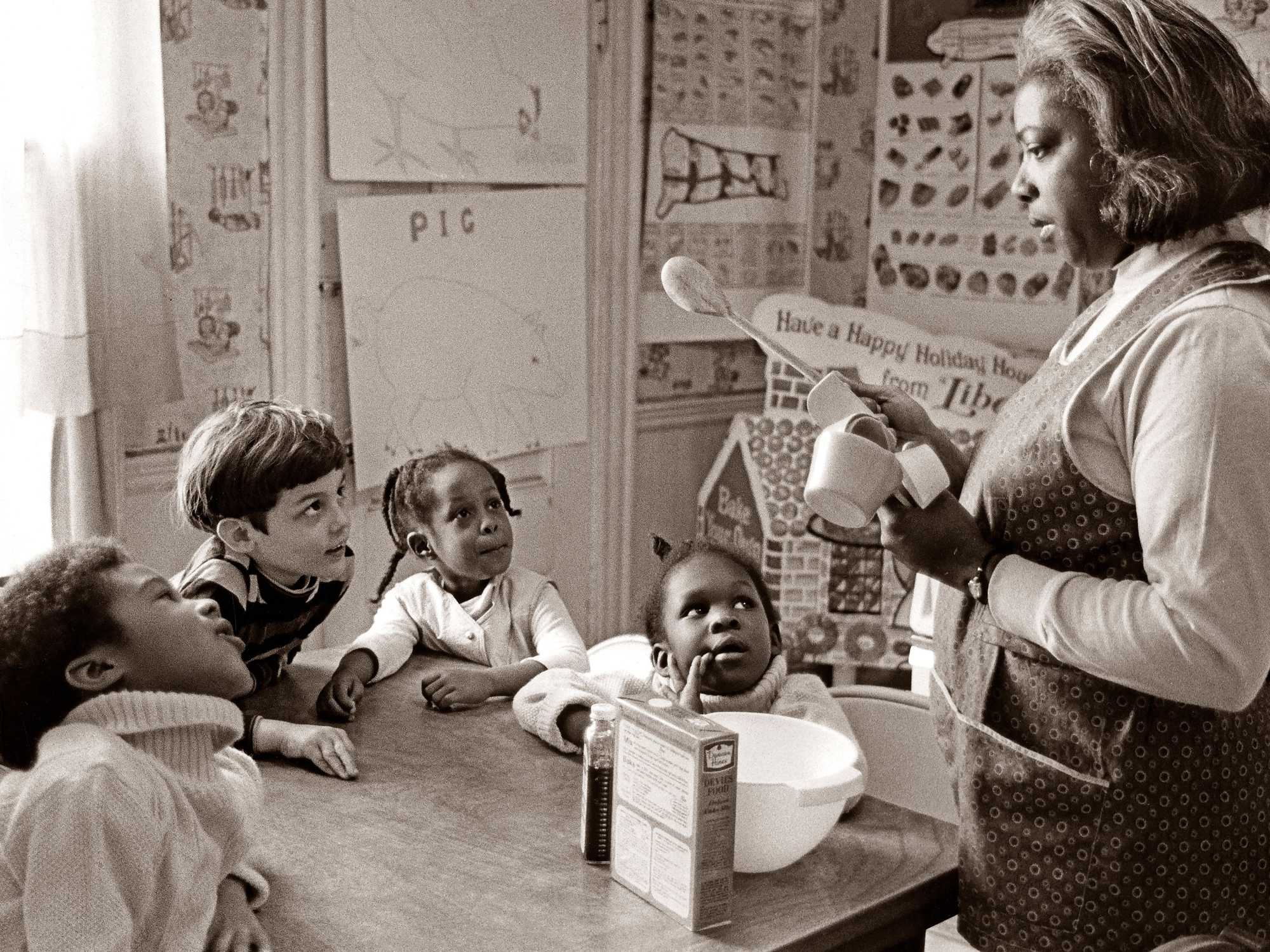 Cecilia Washington, Roxbury Community School dietician and chief cook, gave a group of students a cooking demonstration in 1969. (Gil Friedberg/Globe Staff)