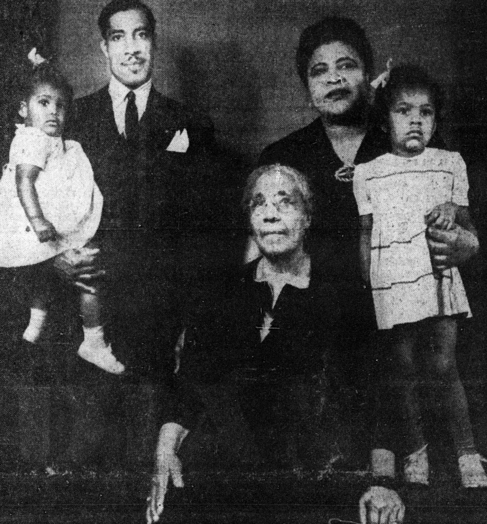 Mary C. Jackson (second from right) posed for a portrait with her family. Jackson was the proprietor of the Western Lunch Box on Mass Ave. From left, granddaughter Mary Ethel, son Lachester, mother, Jerrie Johnson, Jackson, and granddaughter Larrine. 