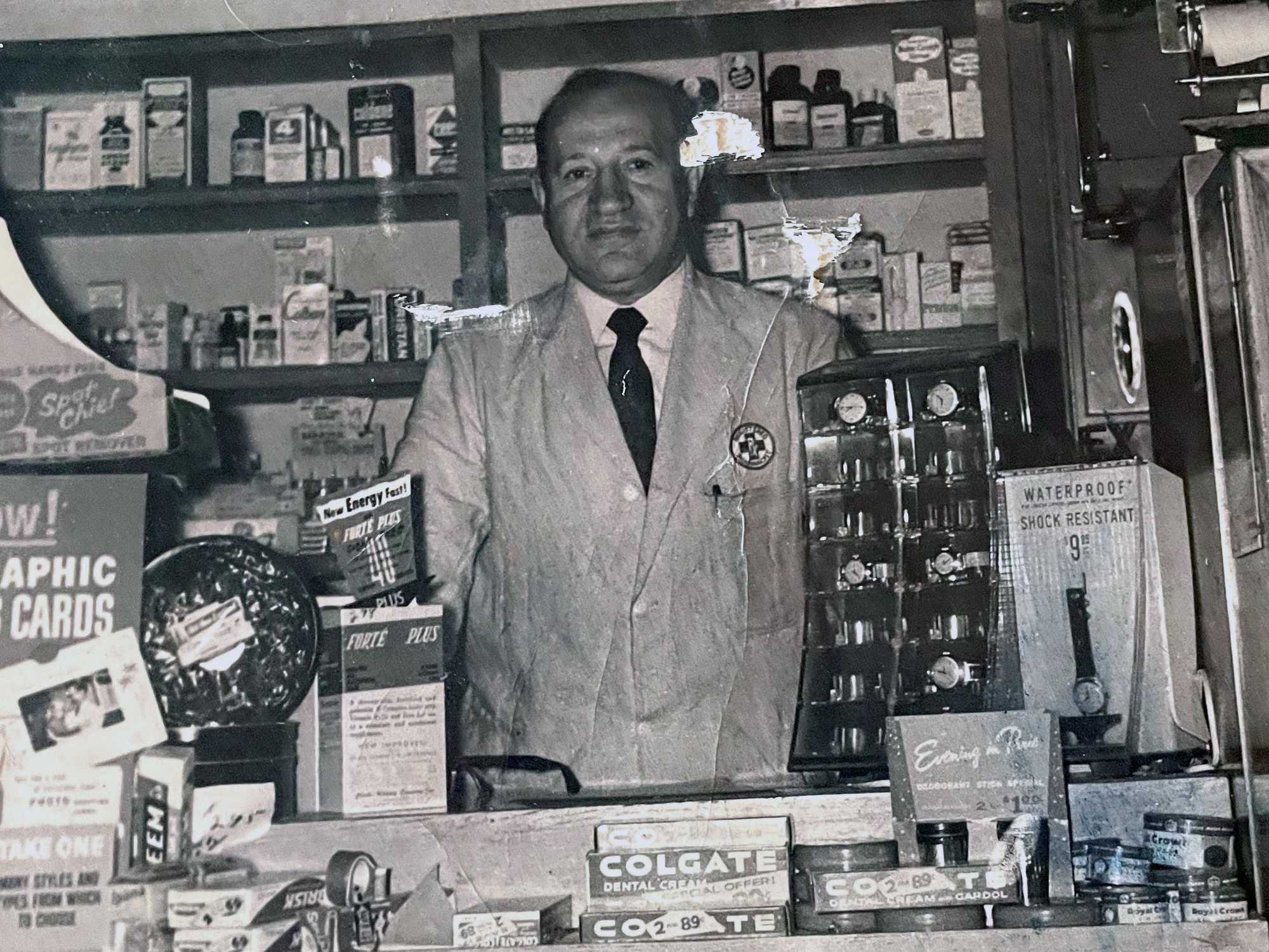 Henry Shapiro behind the counter of Kornfield Pharmacy. The photo was taken at some point in the 1950s.