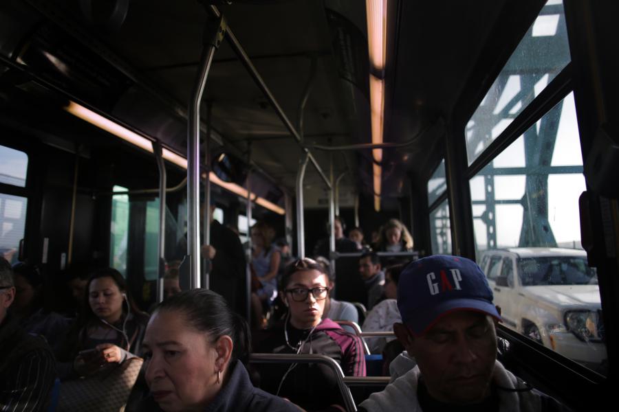 A shot of people sitting inside the 111 bus