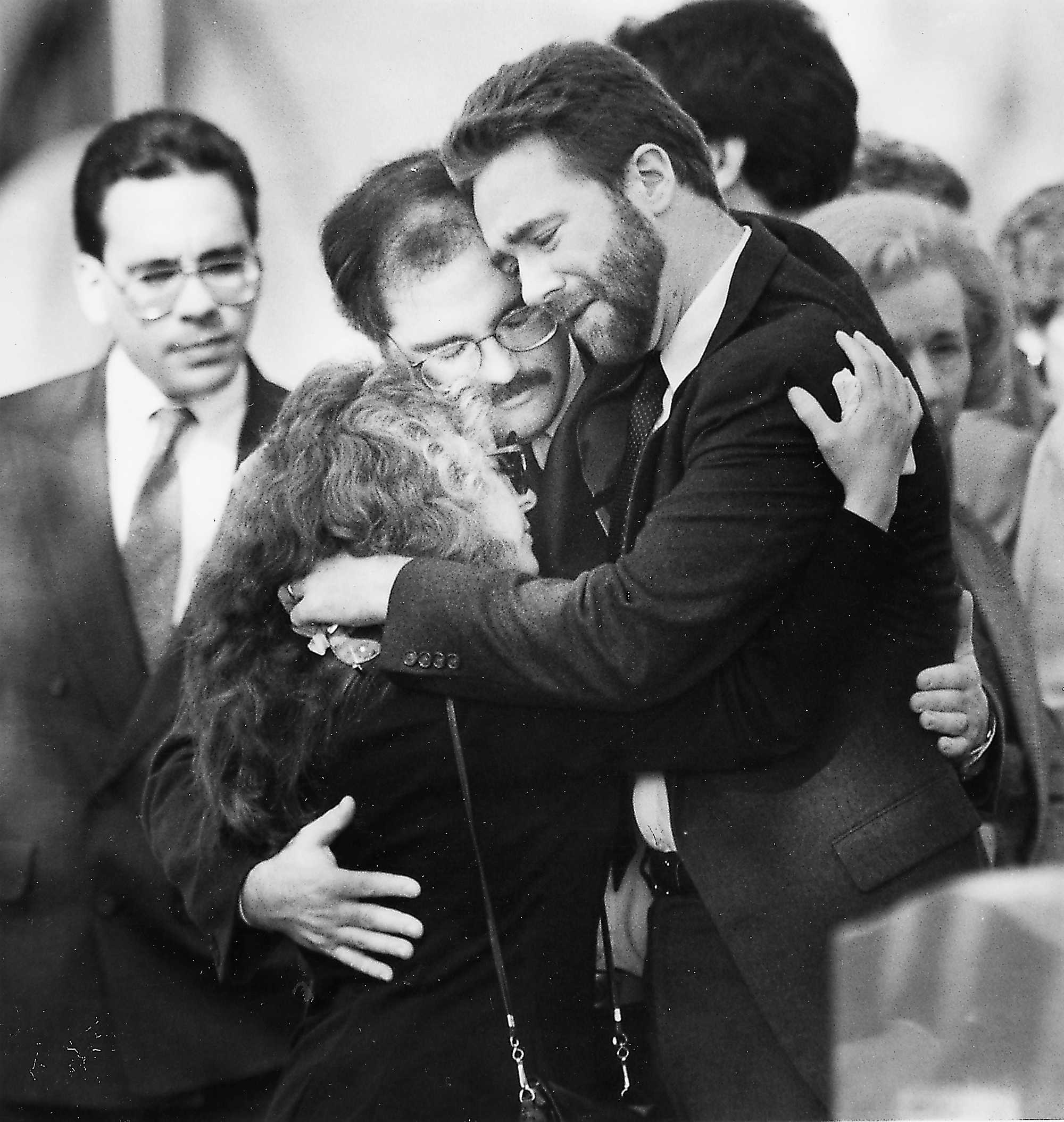 Mourners embraced at the funeral of Carol Stuart at St. James Church on Oct. 28, 1989.