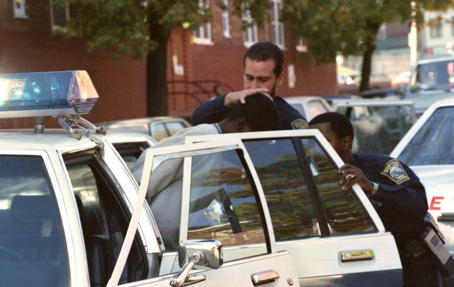 10/25/1989 Boston, MA - Boston Police detain a black male in the Mission Hill public housing complex, as part of their investigation into the murder of Carol Stuart. (Tom Landers/Globe Staff)

BGPA - Charles Stuart - Carol Stuart