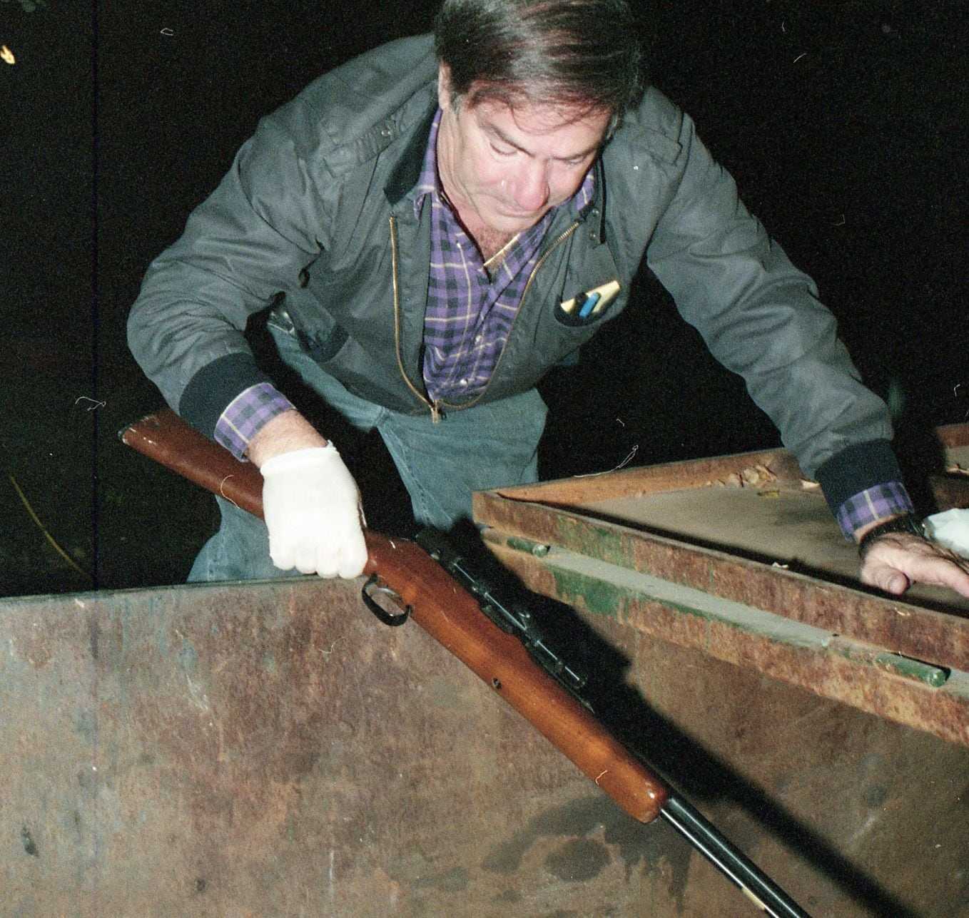  Boston police searched through a dumpster, looking for the gun used in the murder of Carol Stuart on Oct. 29, 1989.